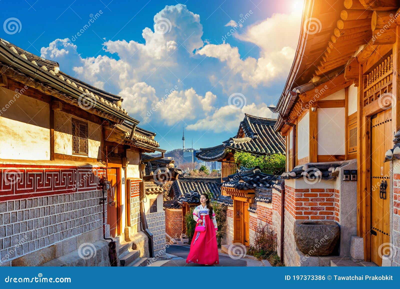 beautiful girl wearing korean traditional hanbok at bukchon hanok village. traditional korean style architecture in seoul,korea