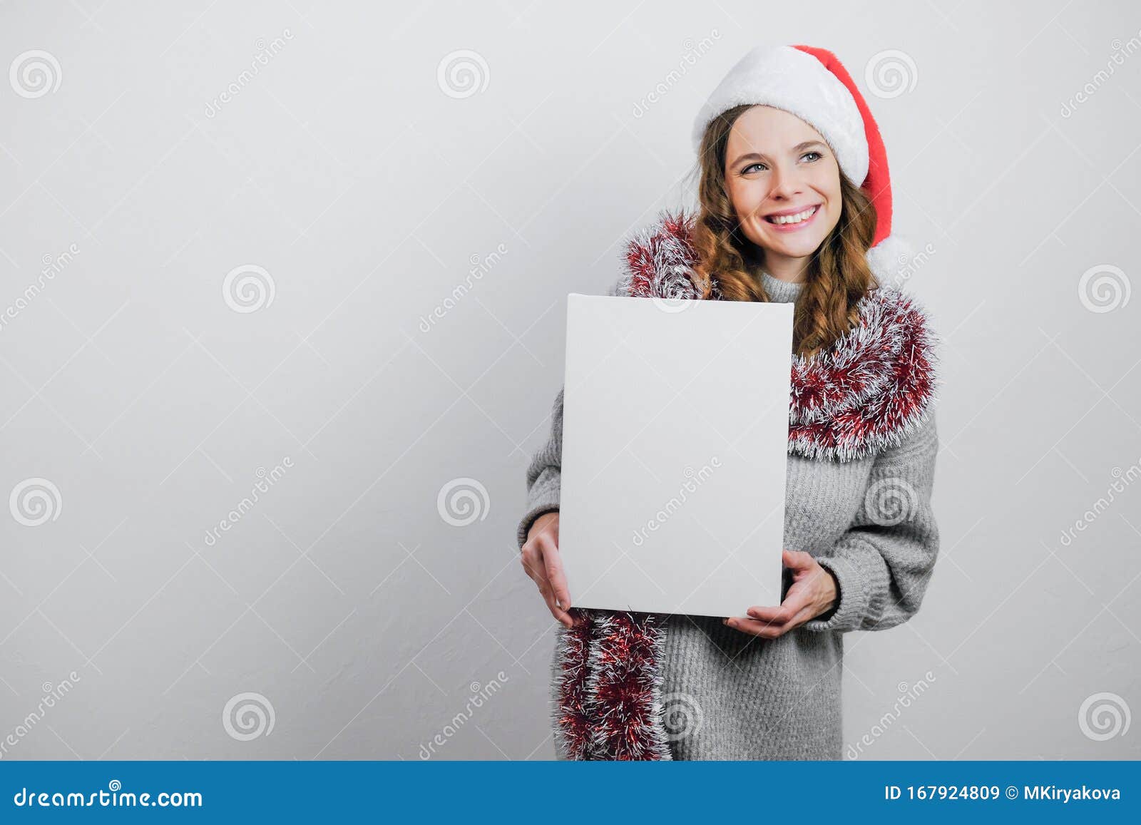 Download Beautiful Girl Wearing Santa Hat With White Empty Canvas ...
