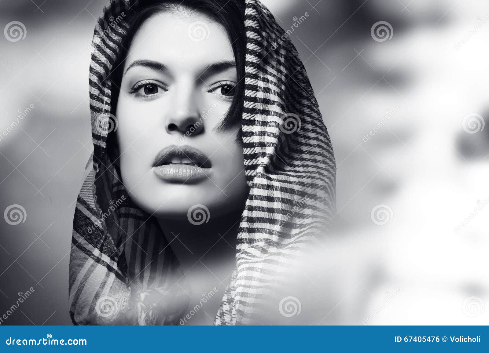 beautiful girl wearing a scarf, portrait, black and white