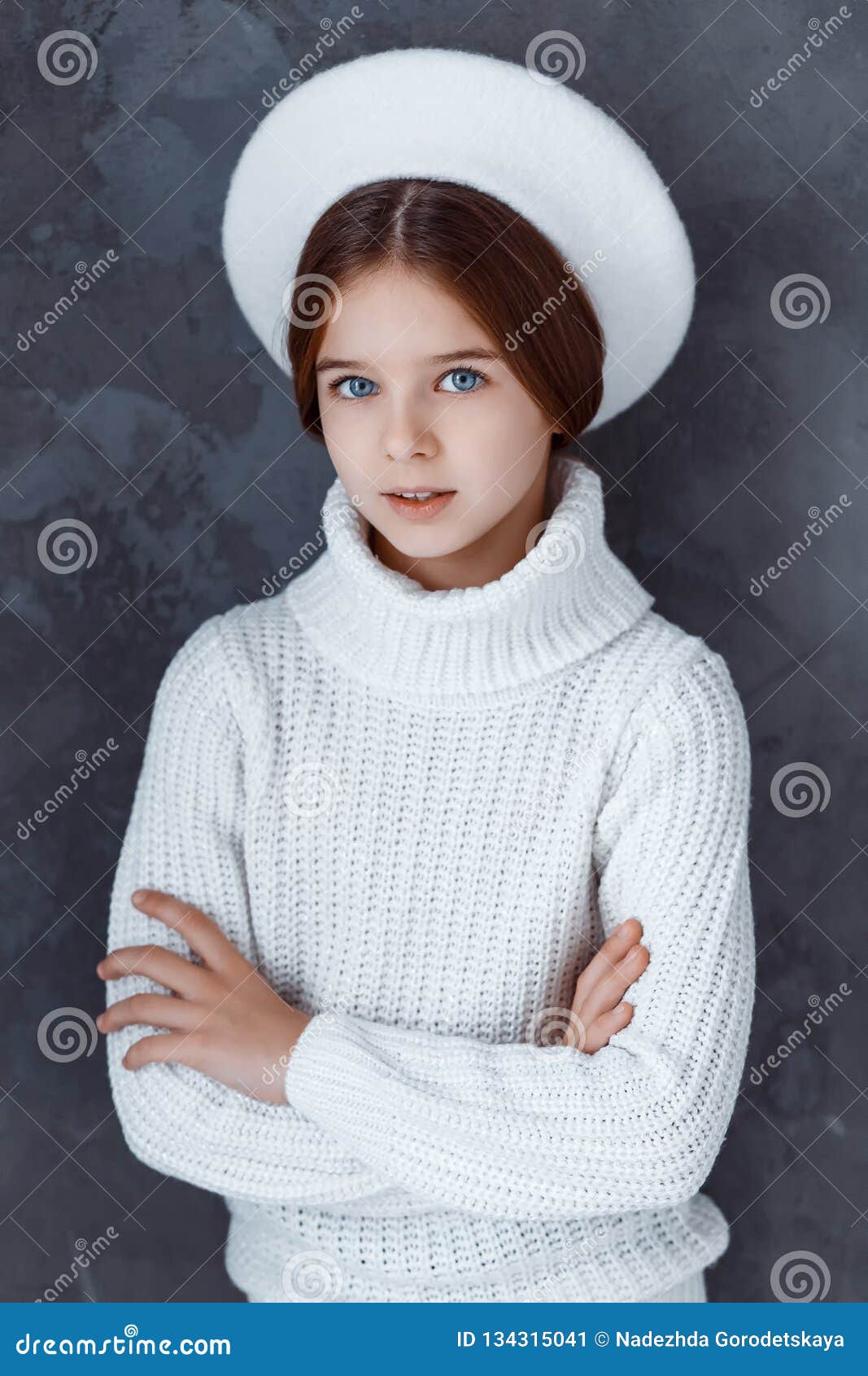 A Beautiful Girl Wearing a White Beret. a Girl in a Studio Stock Image