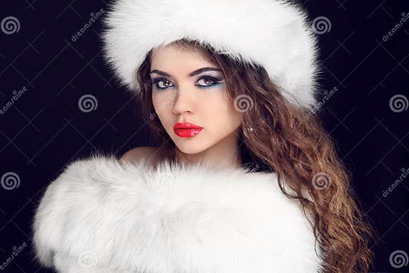 Beautiful Girl Wearing in White Fur Coat and Furry Hat. Winter W Stock ...