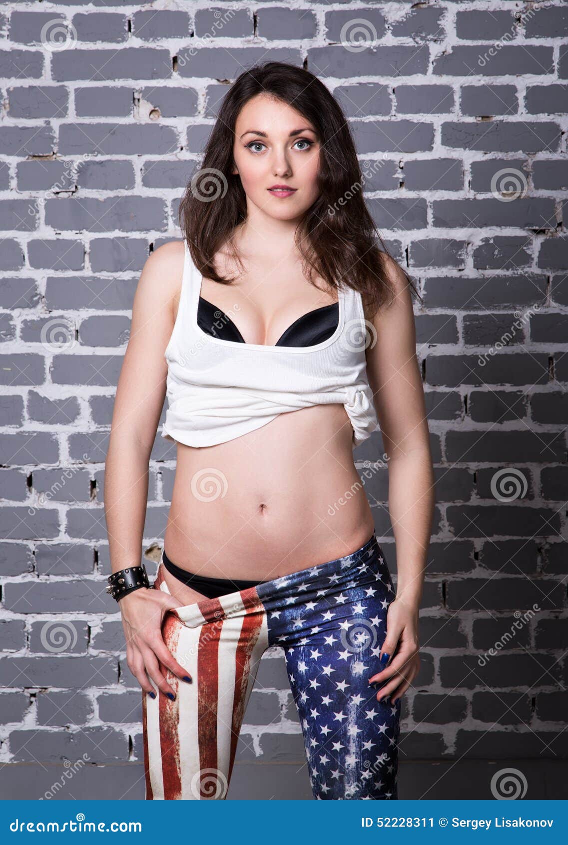 Beautiful Girl in White Shirt in Black Bra in American Flag Pant