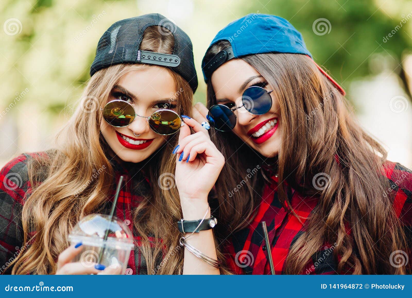 Beautiful Girls Blonde and Brunette Having Fun Together. Stock Photo ...