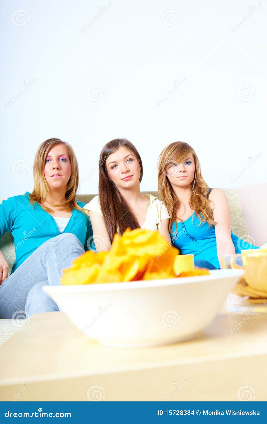 Beautiful girls and chips stock photo. Image of food 15728384