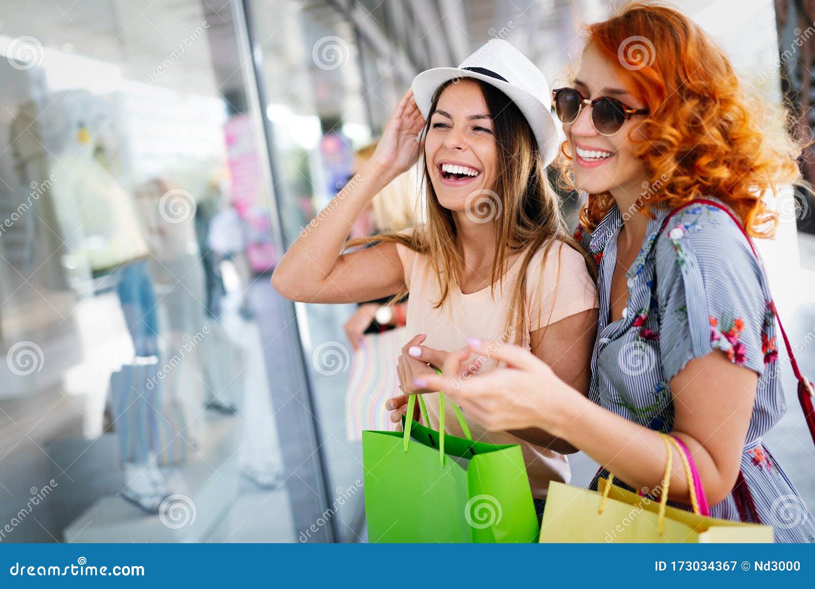 Beautiful Women with Shopping Bags Walking at the Mall Stock Image ...