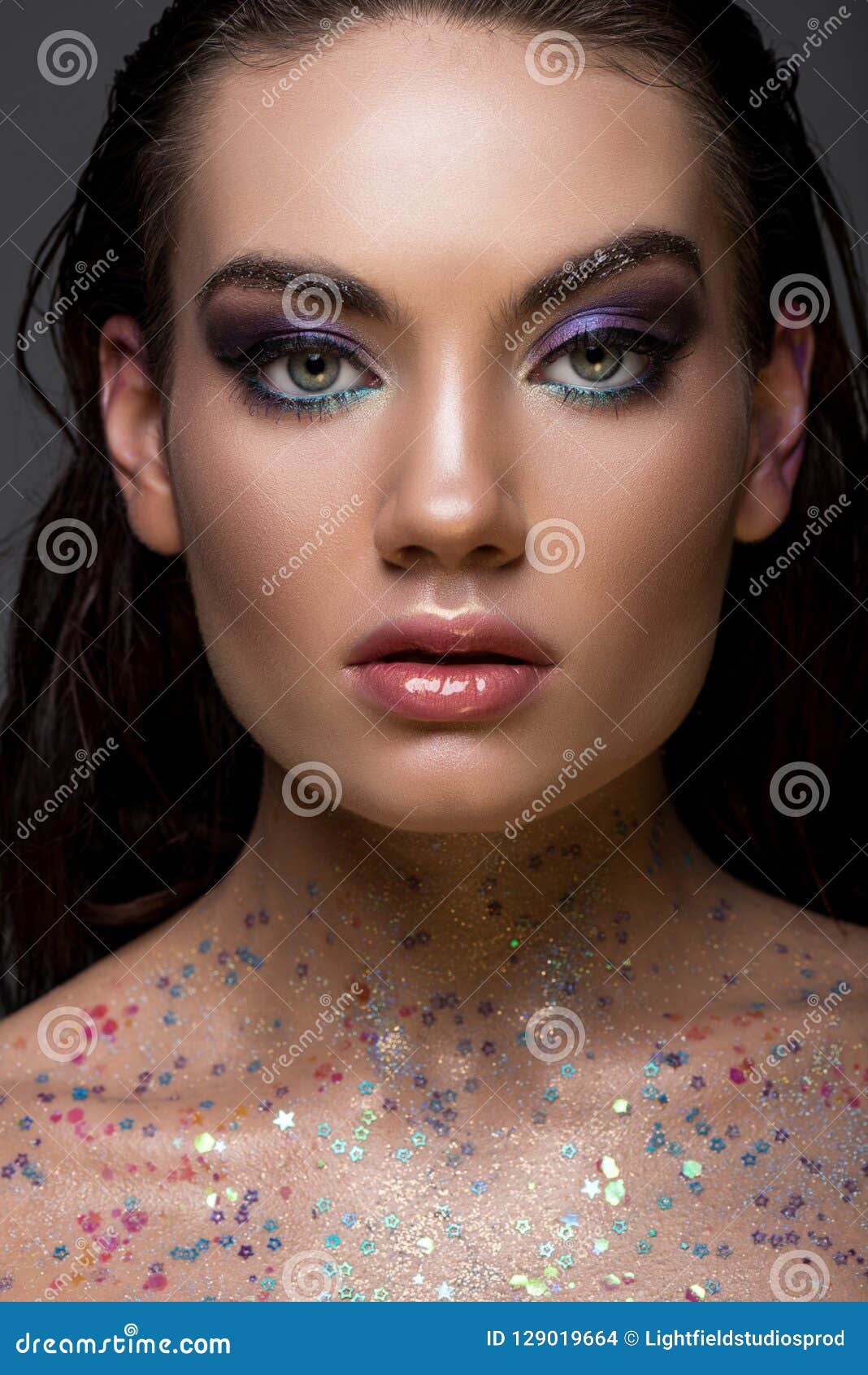 Beautiful Glamorous Girl Posing With Glitter On Body And Looking At Camera Stock Photo Image Of Lookingatcamera Charming