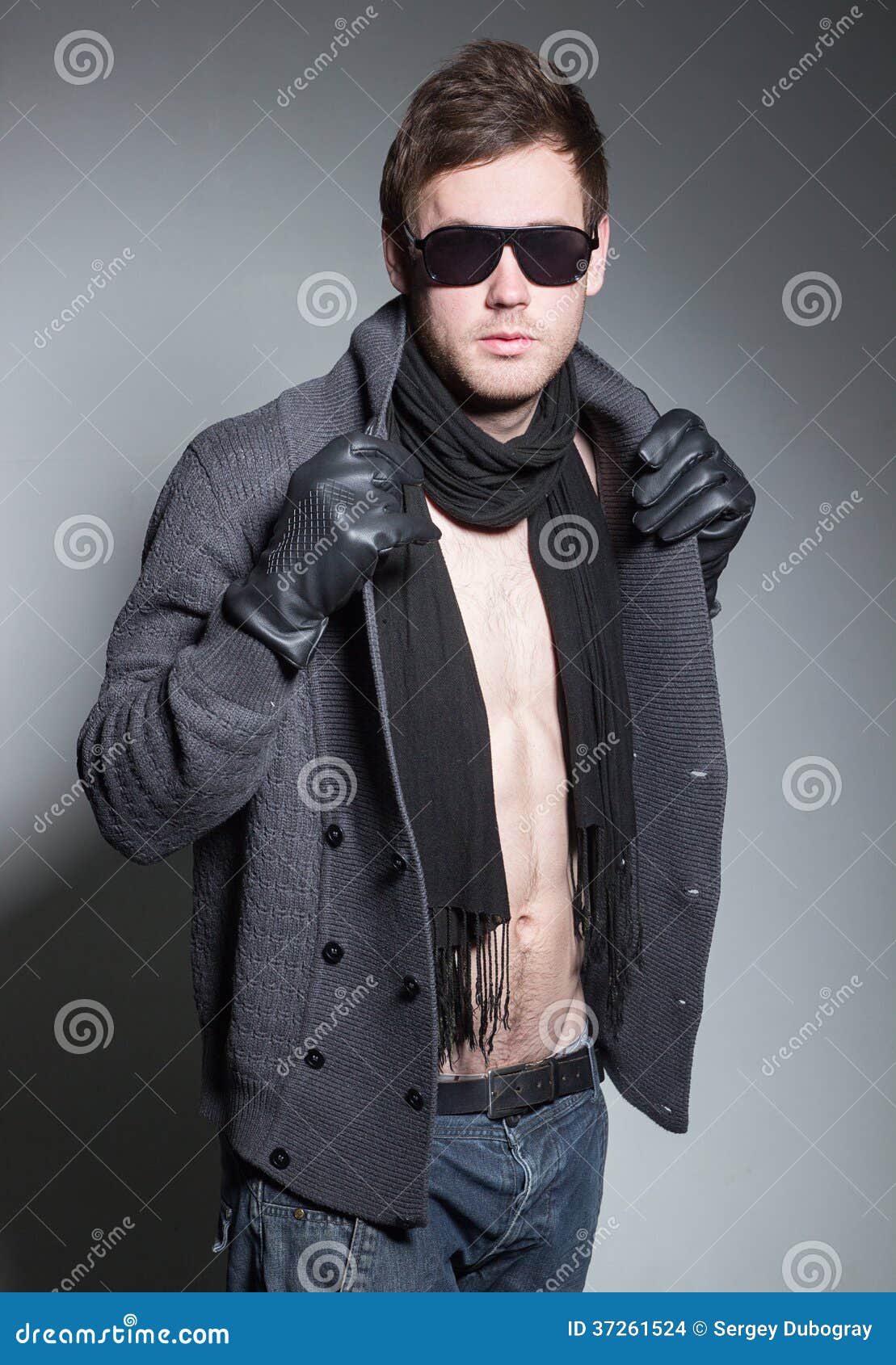 Beautiful Glamorous Guy Wearing a Scarf and Goggles Stock Photo Image