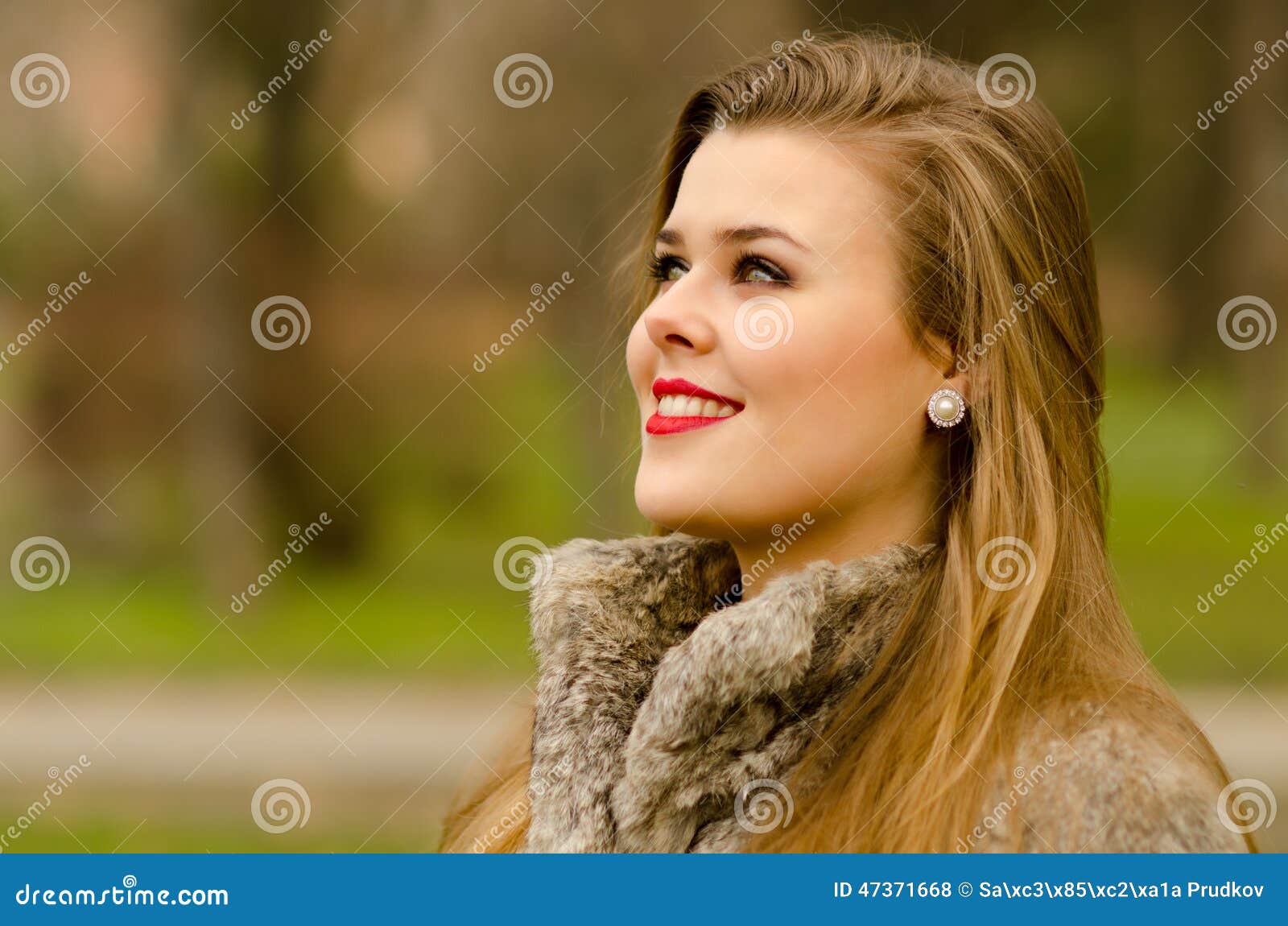 Beautiful Glamorous Lady Having Fun Outdoor on Gloomy Autumn Day Stock