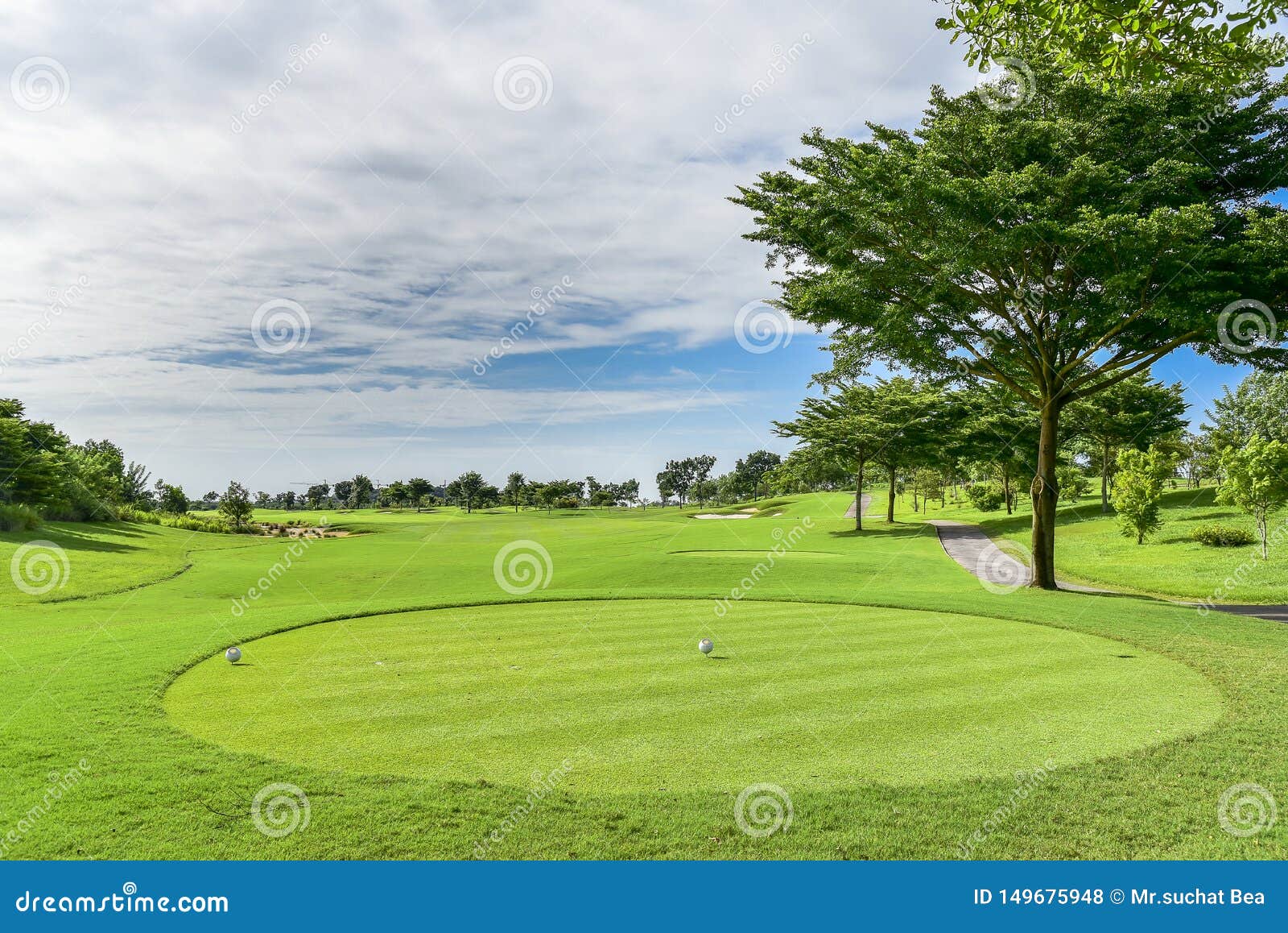 A Beautiful Golf Course , Sand Bunker and Green Grass Stock Photo