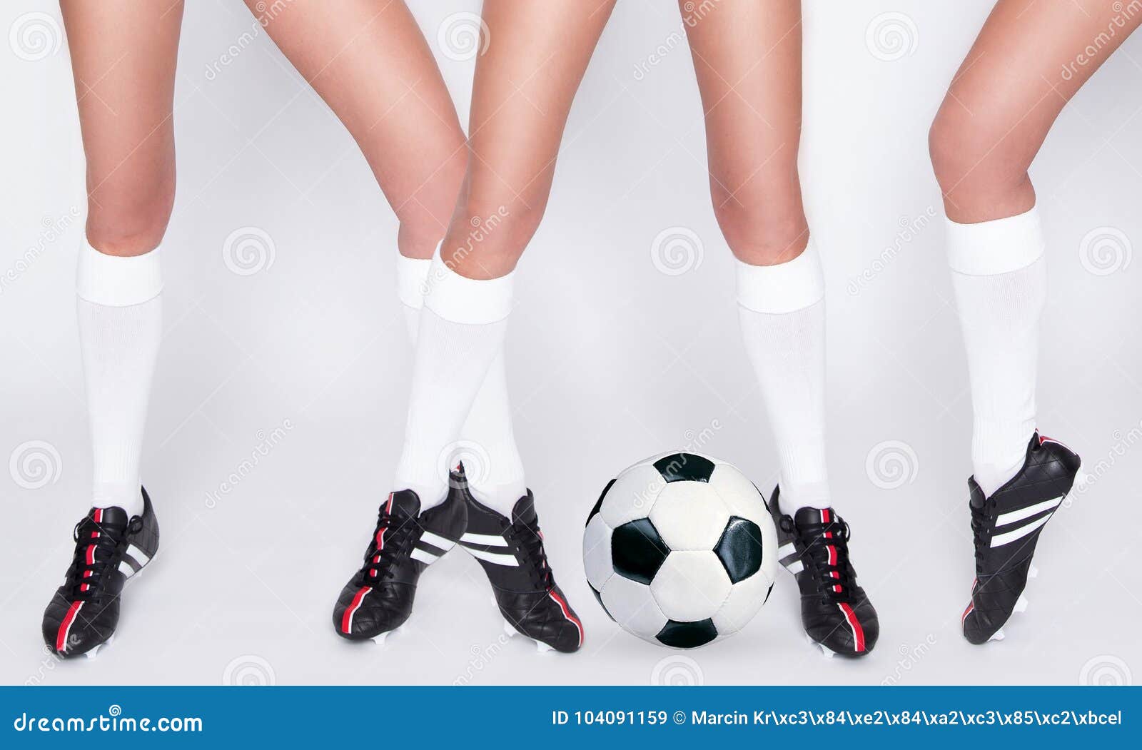 Beautiful Gorgeous Sex Young Athletic Girl, Blonde Woman Dressed in Sports Attire Holding and Playing Football Stock Image pic