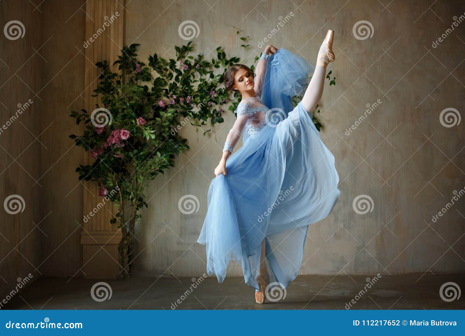 Beautiful Graceful Girl Ballerina in Blue Dress Dancing in Point Stock ...