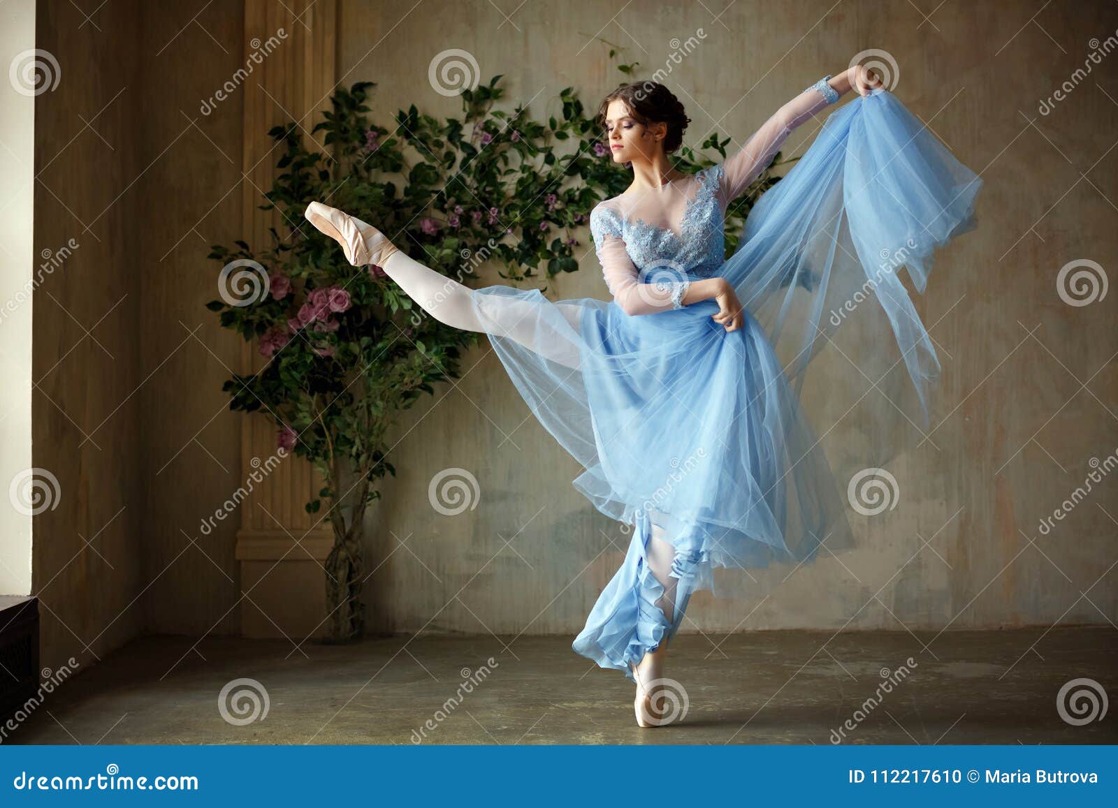 Beautiful Graceful Girl Ballerina in Blue Dress Dancing in Point Stock ...