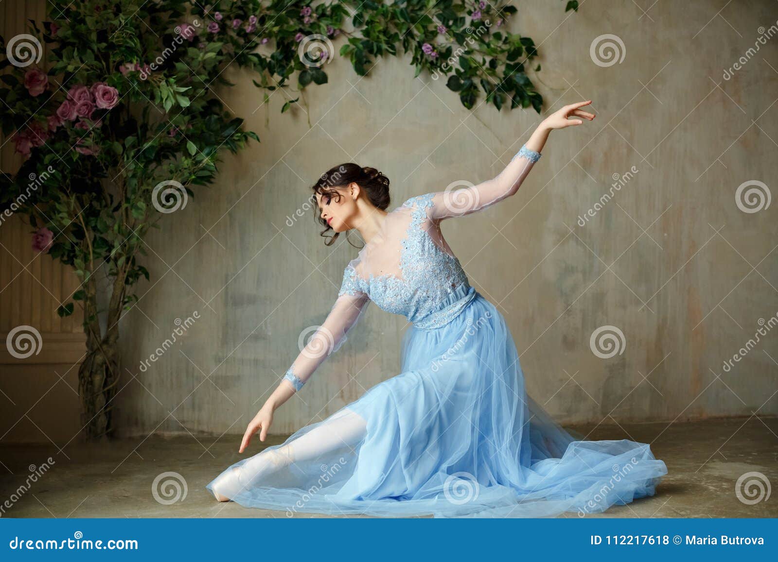 Beautiful Graceful Girl Ballerina in Blue Dress and Pointe Shoes Stock ...