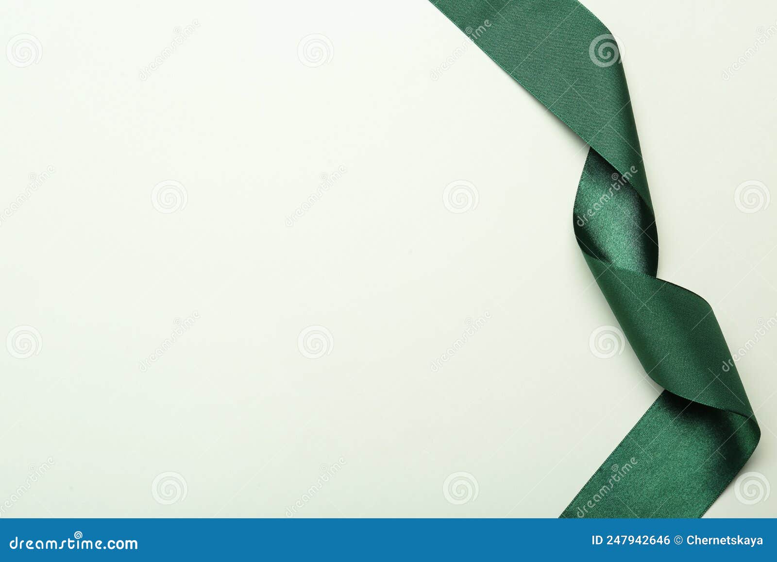 Beautiful Green Ribbon on White Background, Top View. Space for Text