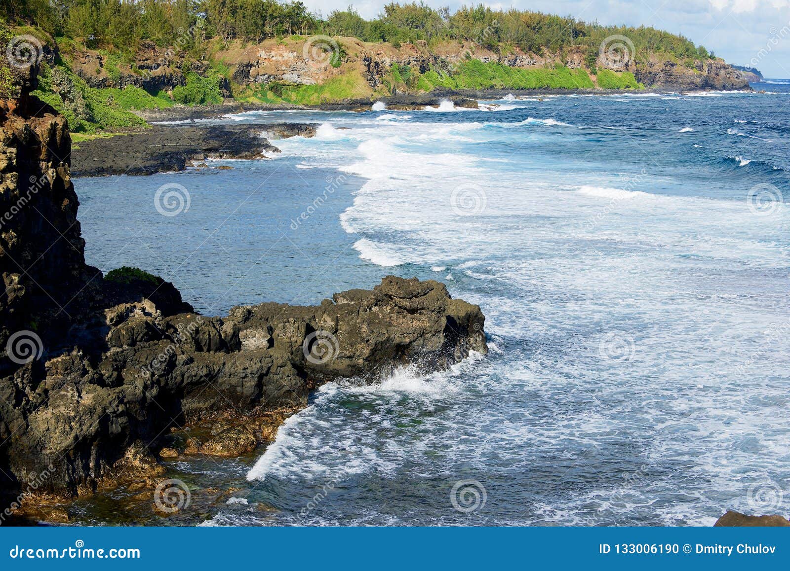 beautiful gris-gris beach with blue sky and indian ocean waves at mauritius island.