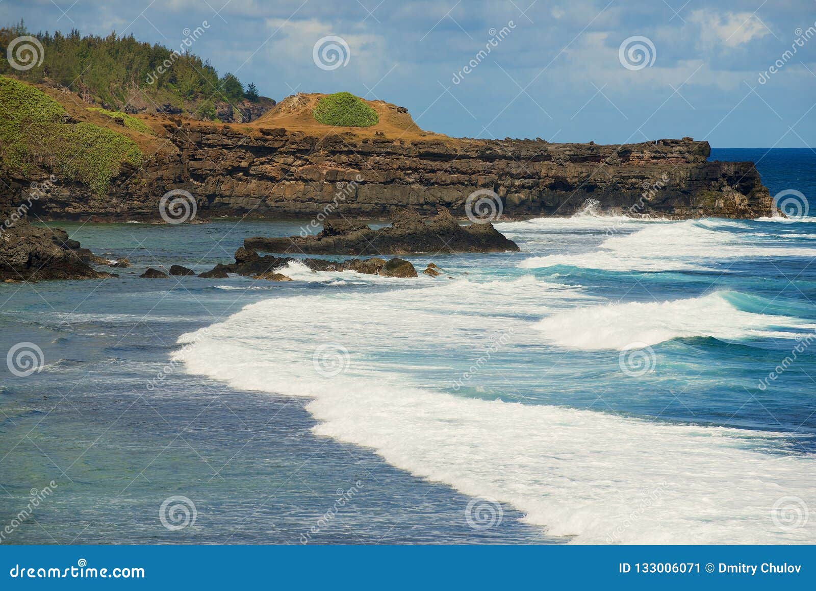 beautiful gris-gris cape with blue sky and indian ocean waves at mauritius island.