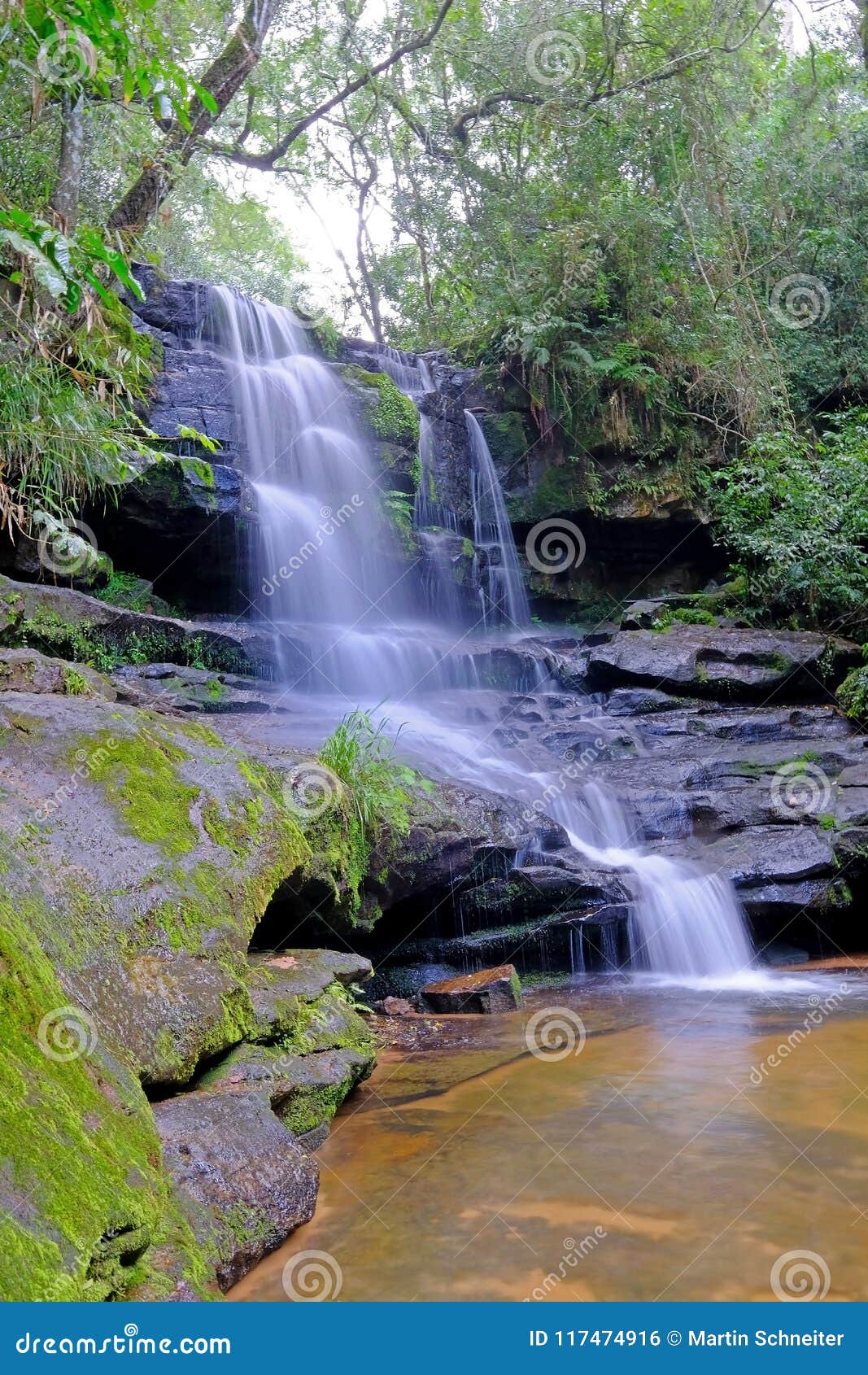 the beautiful guarani waterfall in the rainforest of ybycui national park, paraguay