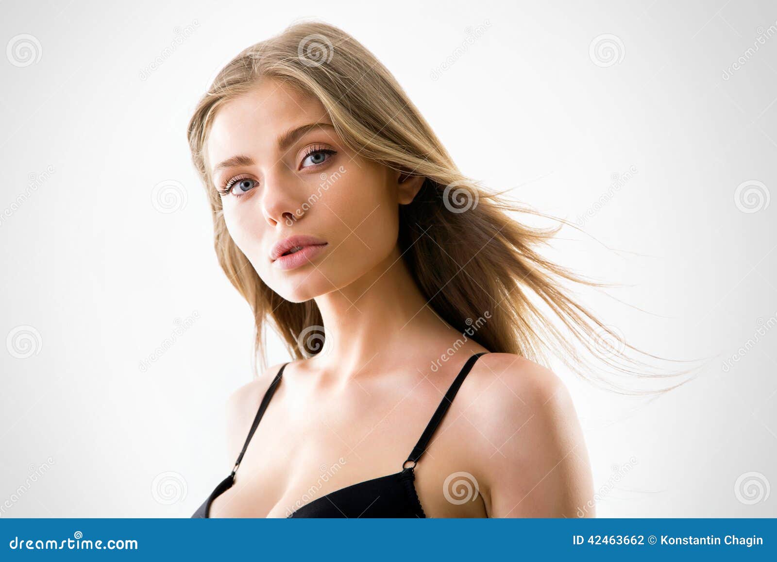Beautiful half-dressed woman with magnificent hair