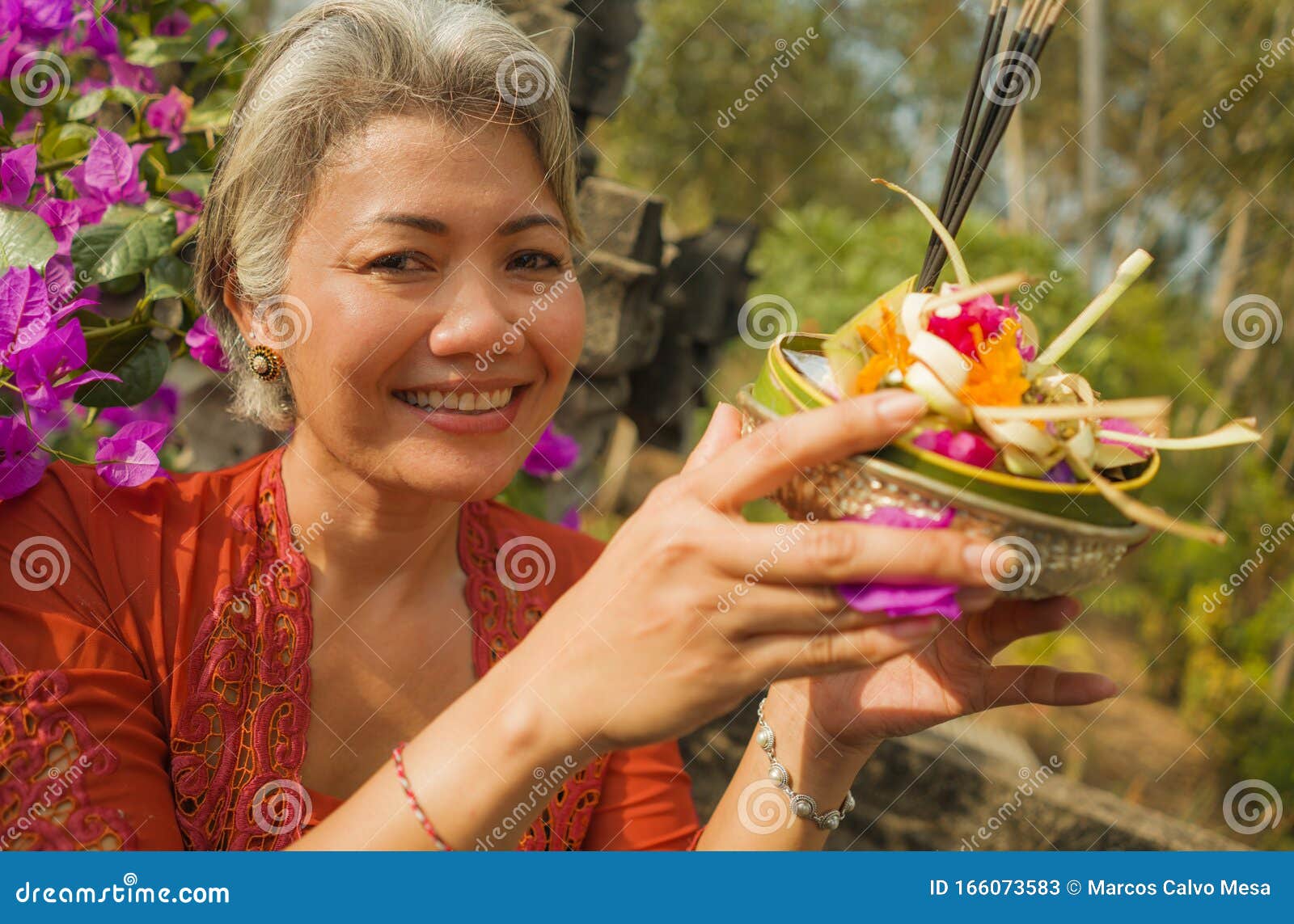 Beautiful And Happy Asian Indonesian Woman Dressed In Traditional