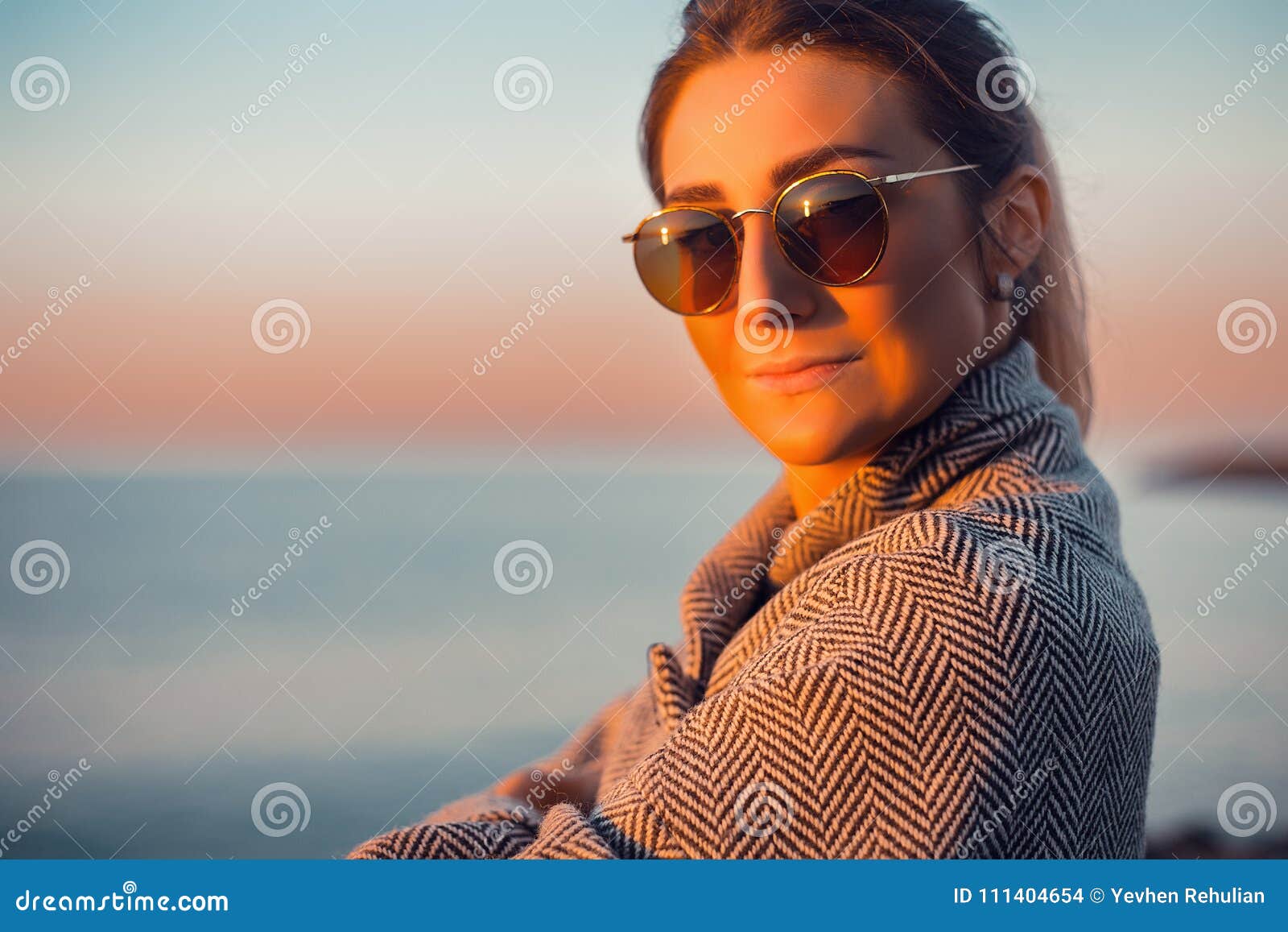 Beautiful Happy Woman In Sunglasses Standing At The Sea
