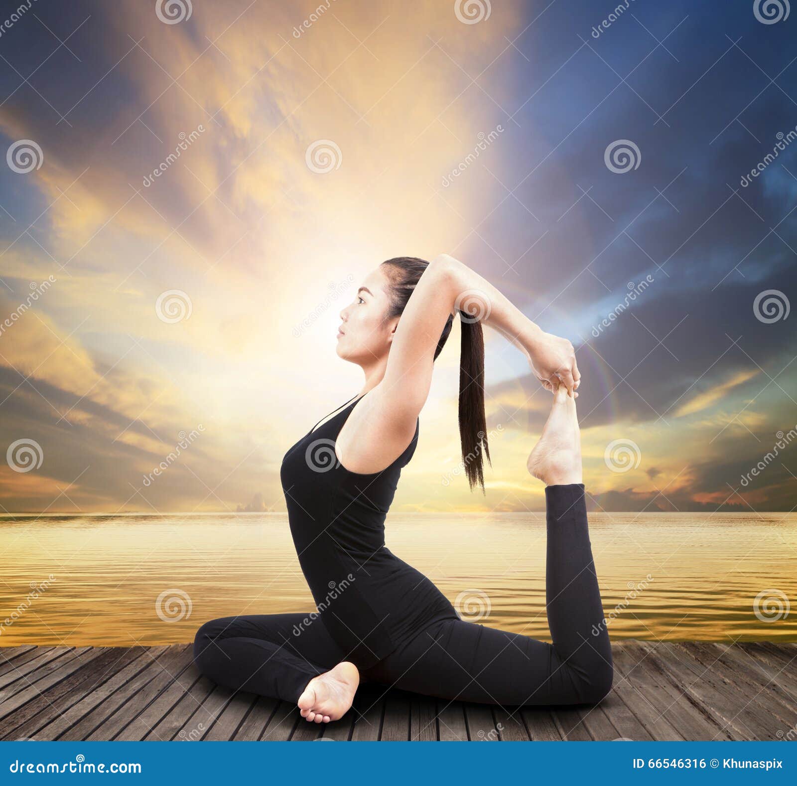 beautiful health care asian woman posting yoga at wood terrace