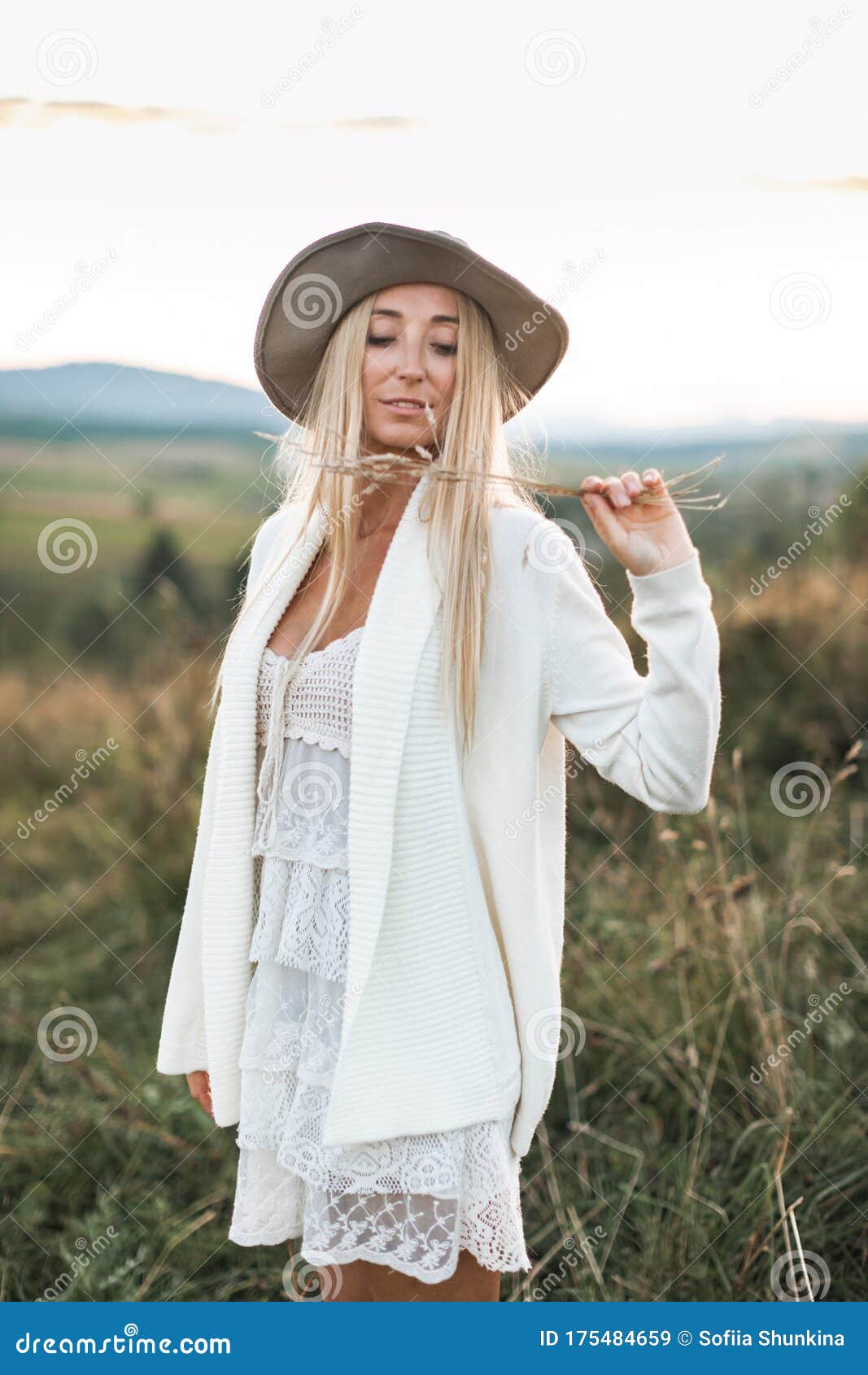 Beautiful Hippie Girl Holding Dried Spike Grass, Wearing White Clothes ...
