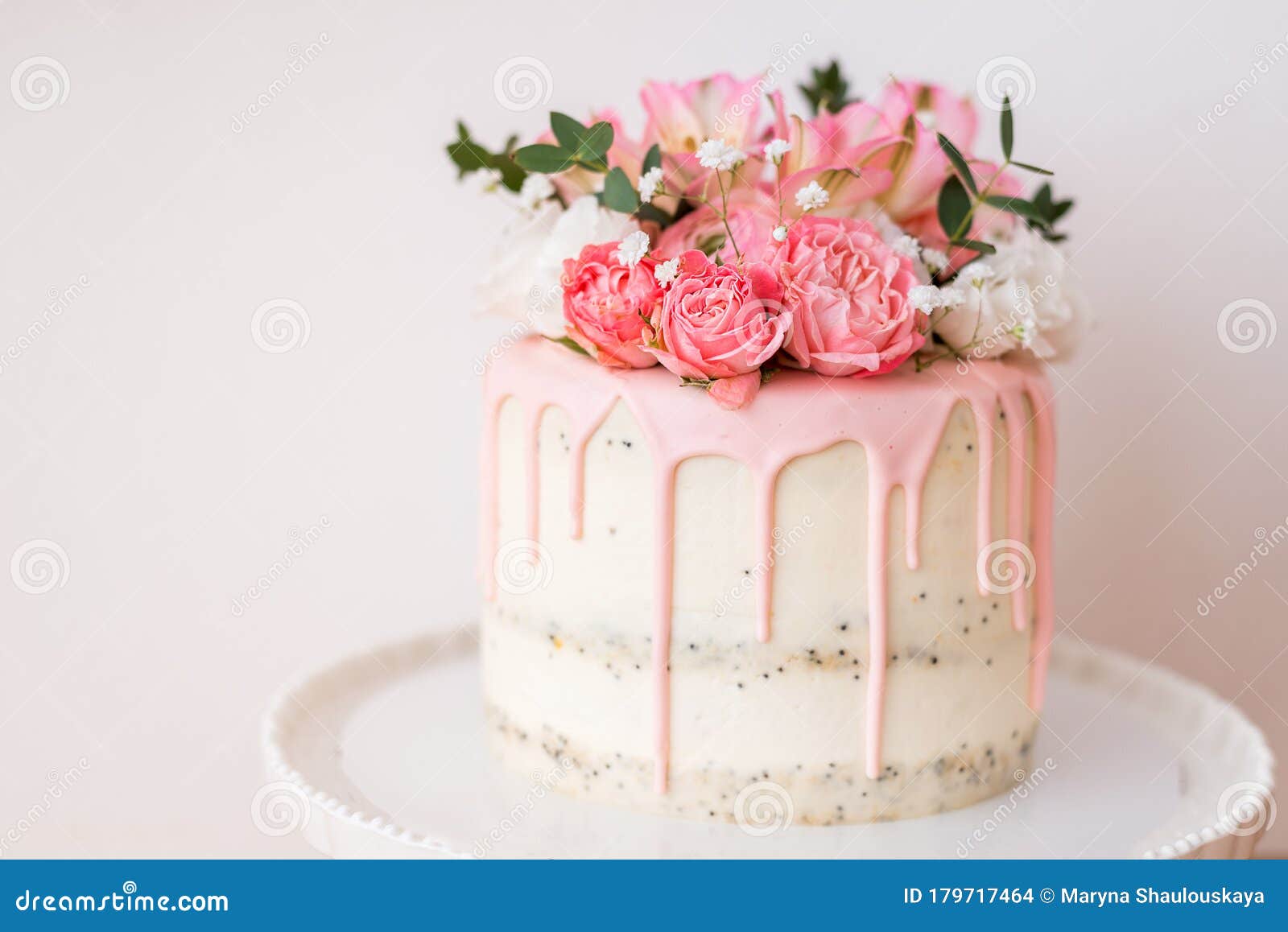 Beautiful Homemade Cake Decorated with Flowers . Pink Icing ...