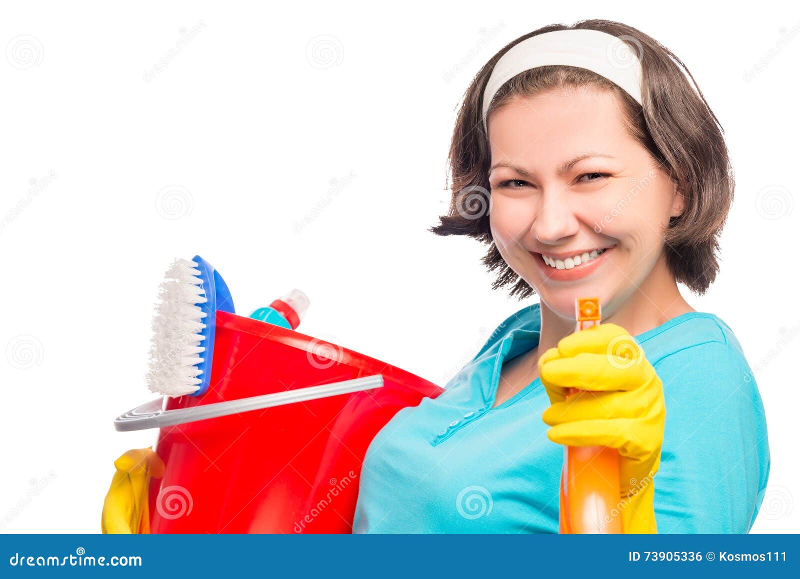 beautiful housewife smiling directs the spray
