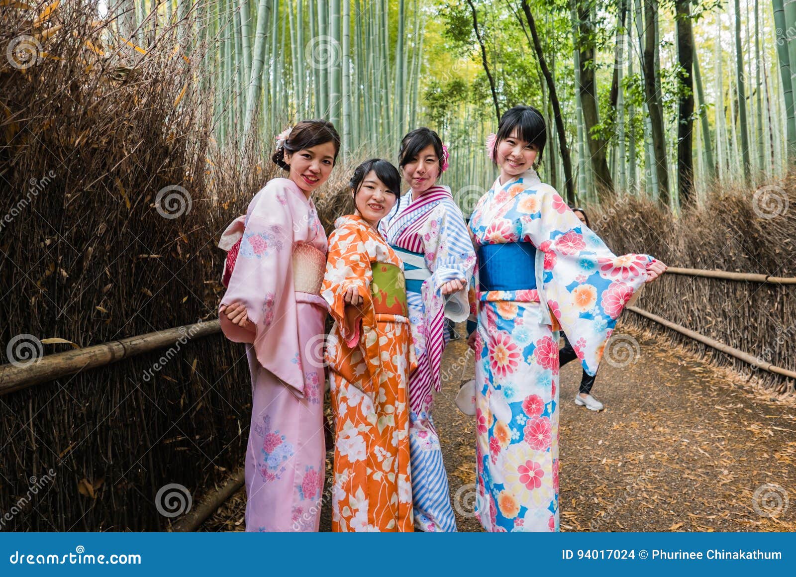 Beautiful Japanese Girls in Kimono Visiting Bamboo Forest of Ara