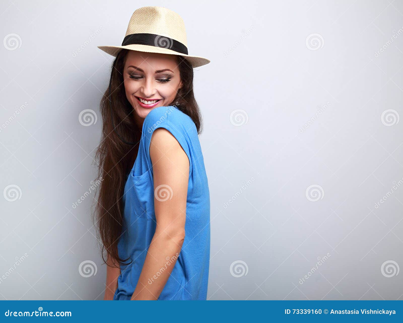 Beautiful Joying Woman with Straw Hat Looking Down with Natural Stock ...