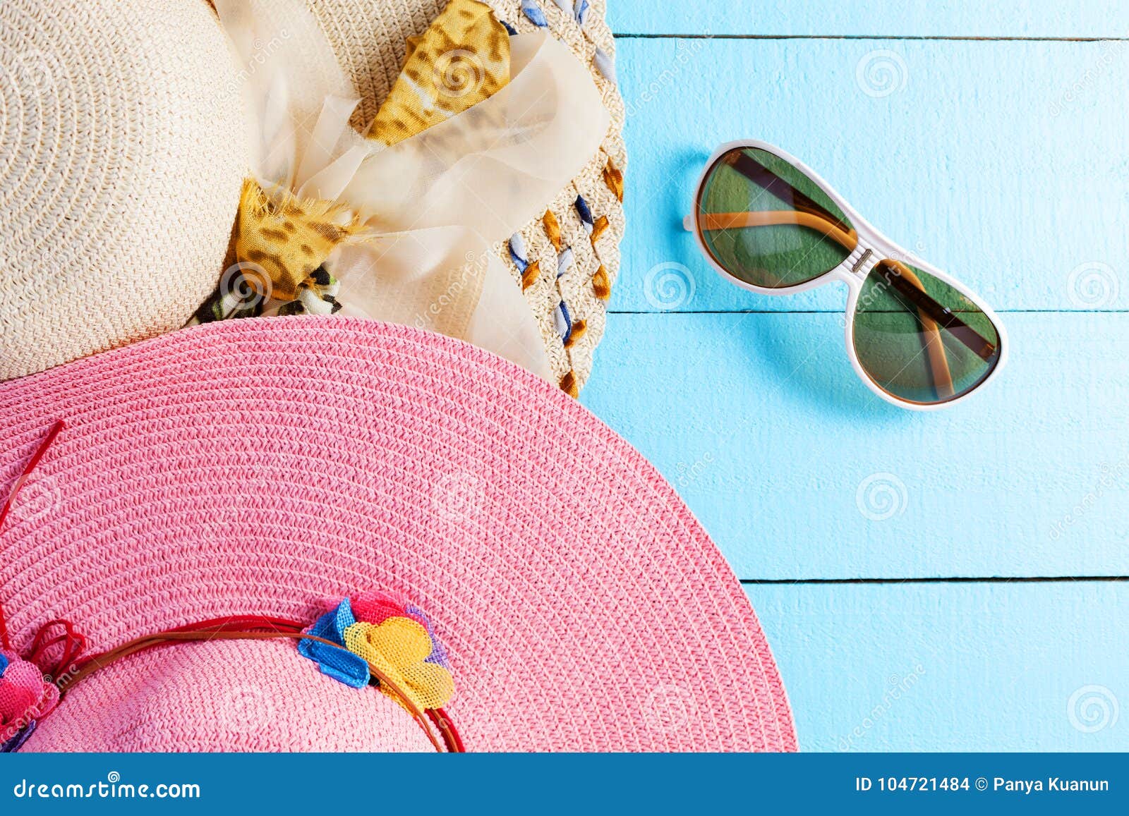 Beautiful Lady Beach Hat with Sunglasses on Blue Wooden Background ...