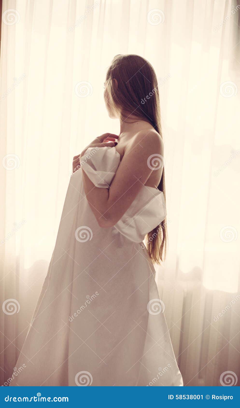 Beautiful Lady With Long Hair Wrapped In Bedsheet Stock 