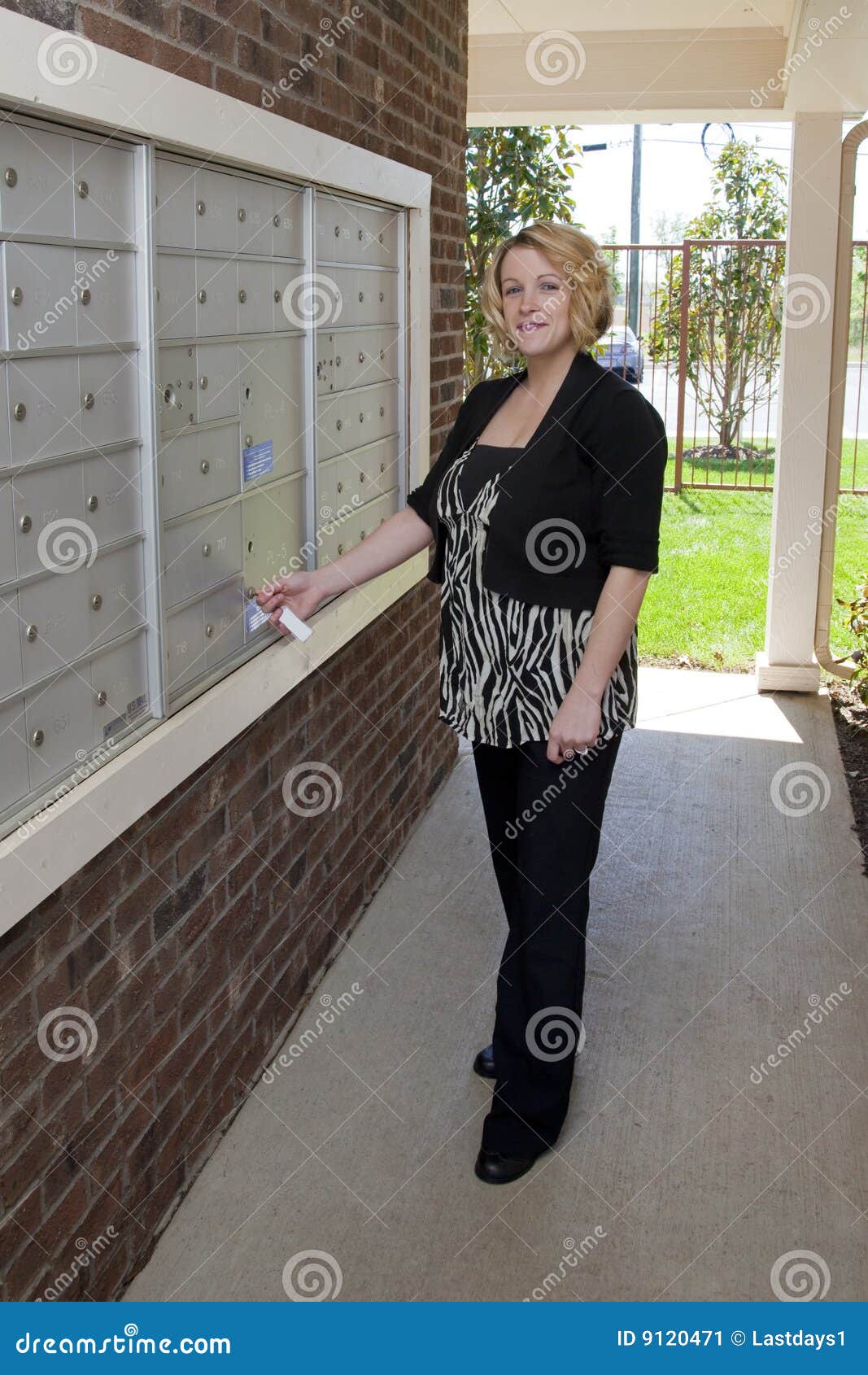 Beautiful Lady at Mail Box stock image. Image of pickup 9120471