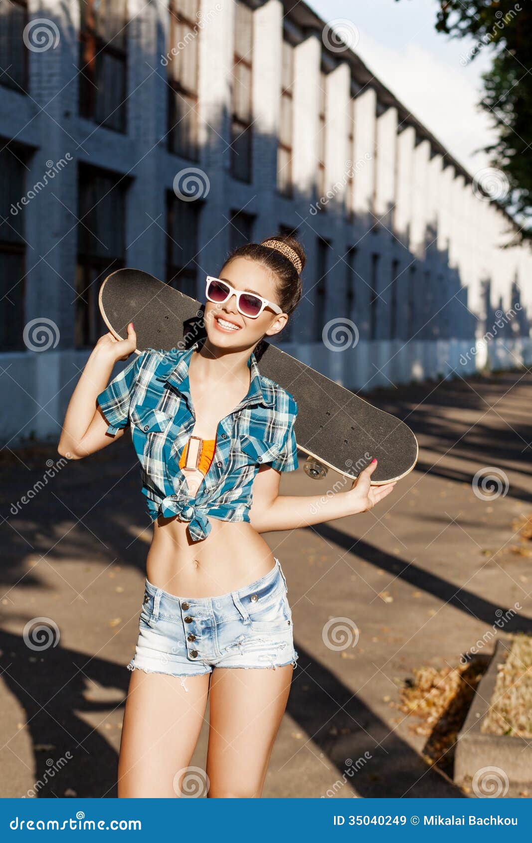 Beautiful Lady With Skateboard In The City Stock Image 