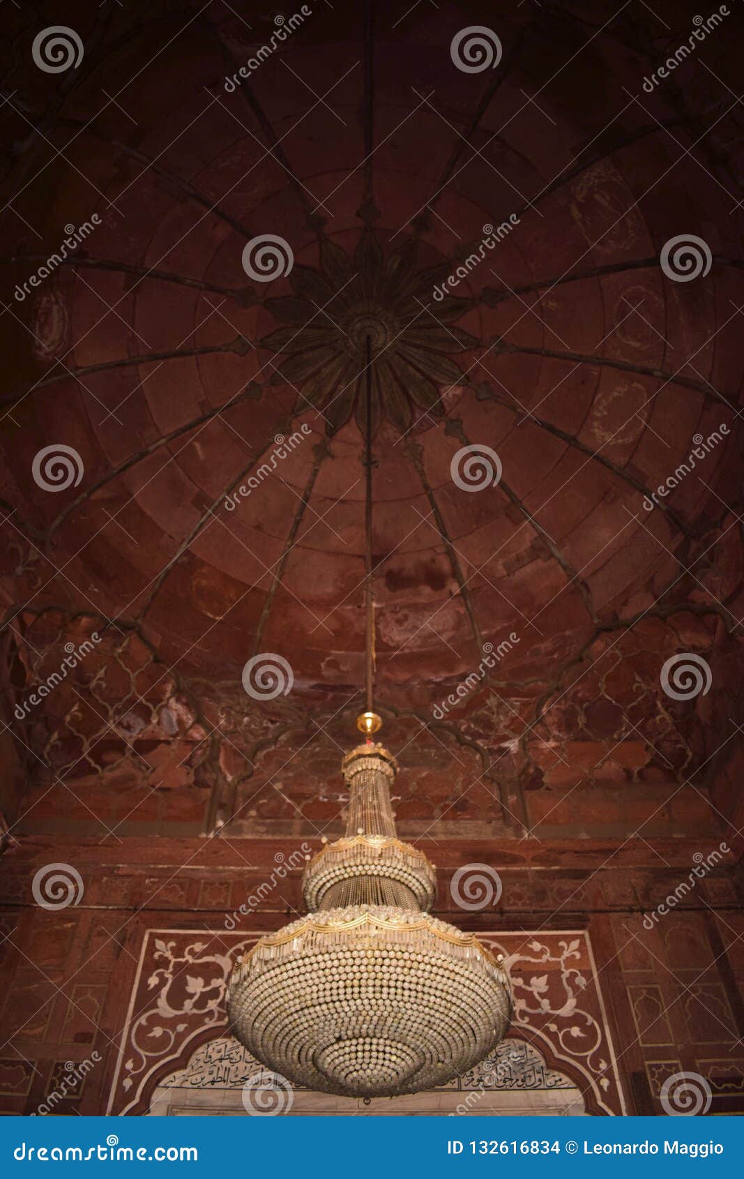 beautiful lamp in the interior of a mosque in delhi