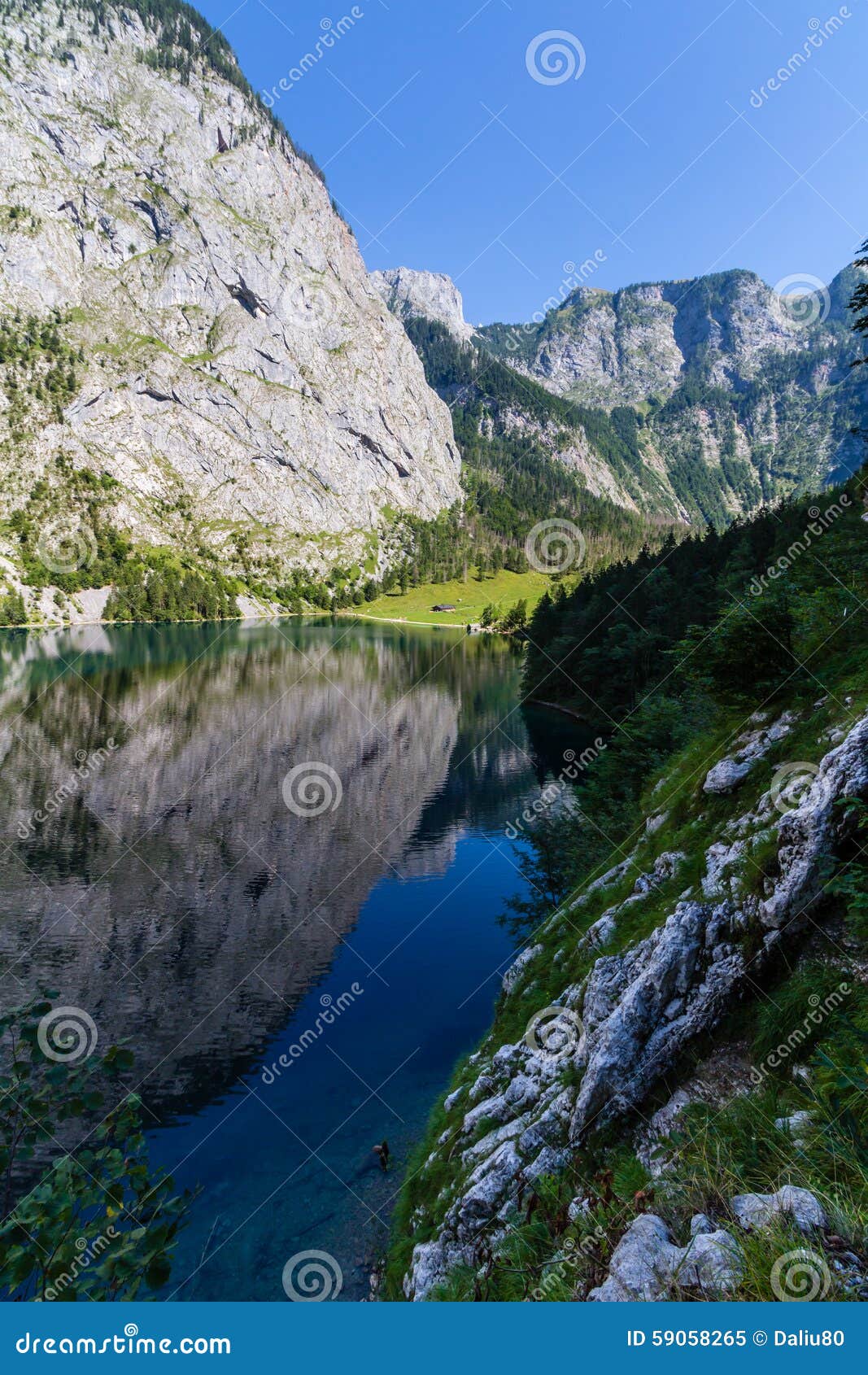 Beautiful Landscape Of Alpine Lake With Crystal Clear Green Water And