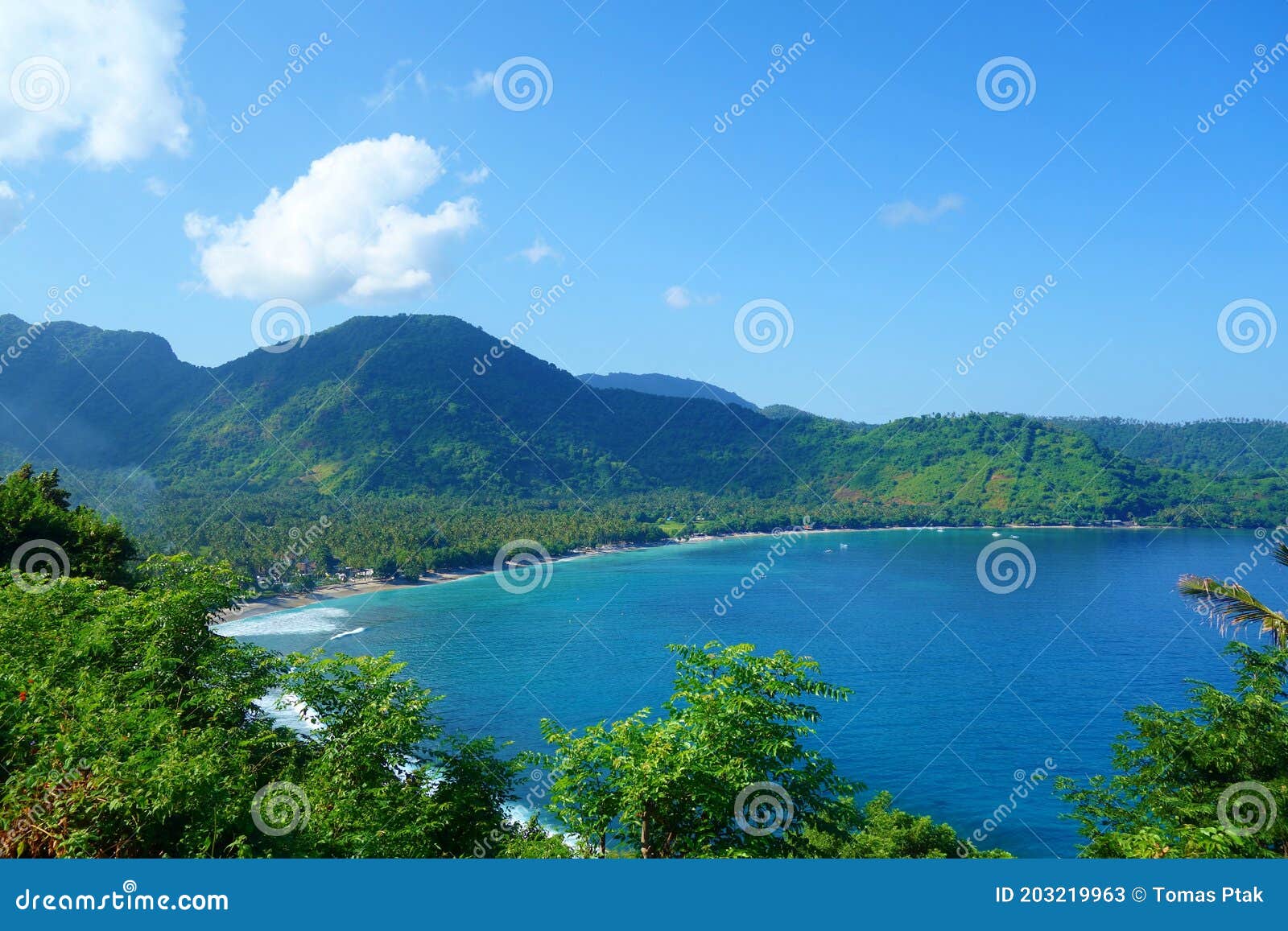 beautiful landscape of pantai nipah, lombok island scenic travel destination beach with crystal blue waters and coconut trees -