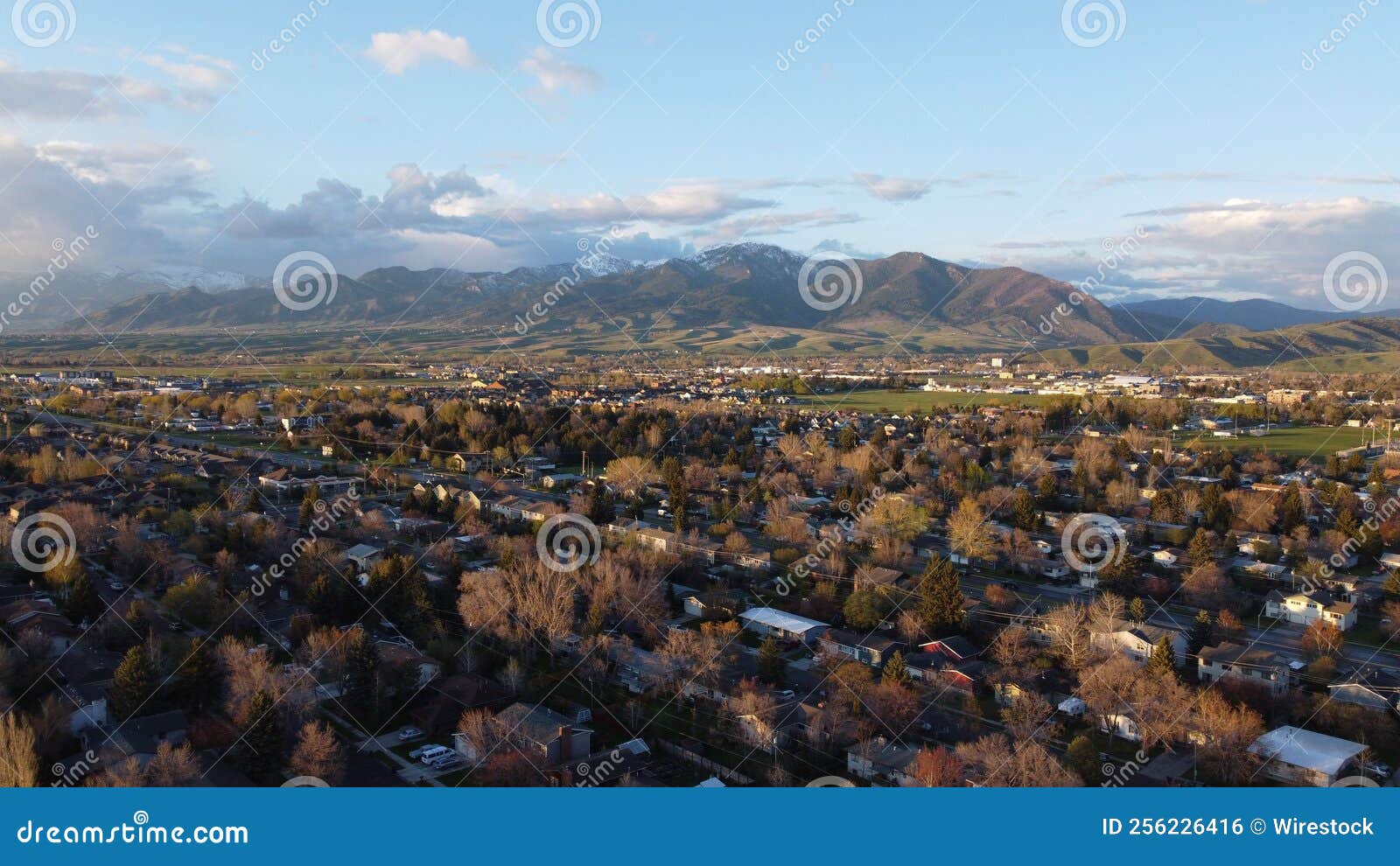 beautiful landscape of the town and the bridger mountain range in a background in bozeman, montana.