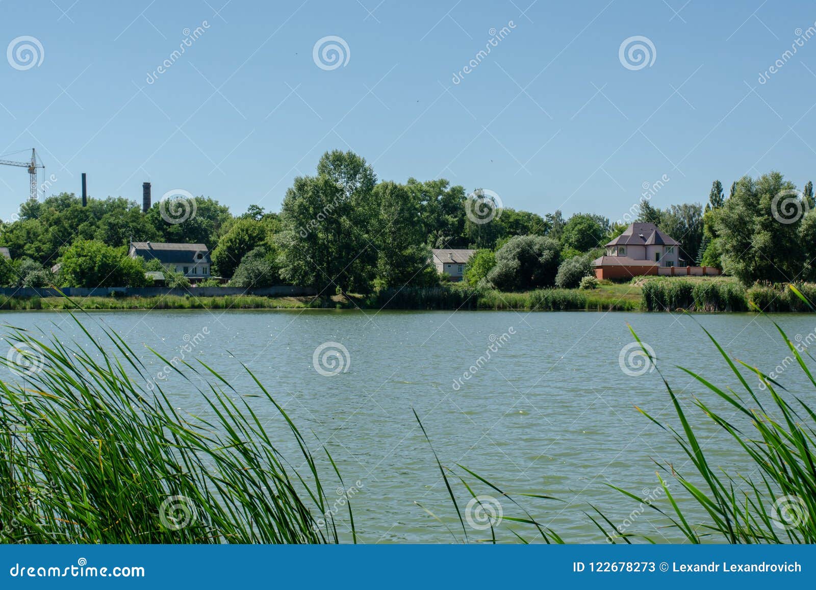 Beautiful Landscape View of the River`s Bank with Houses and Trees ...