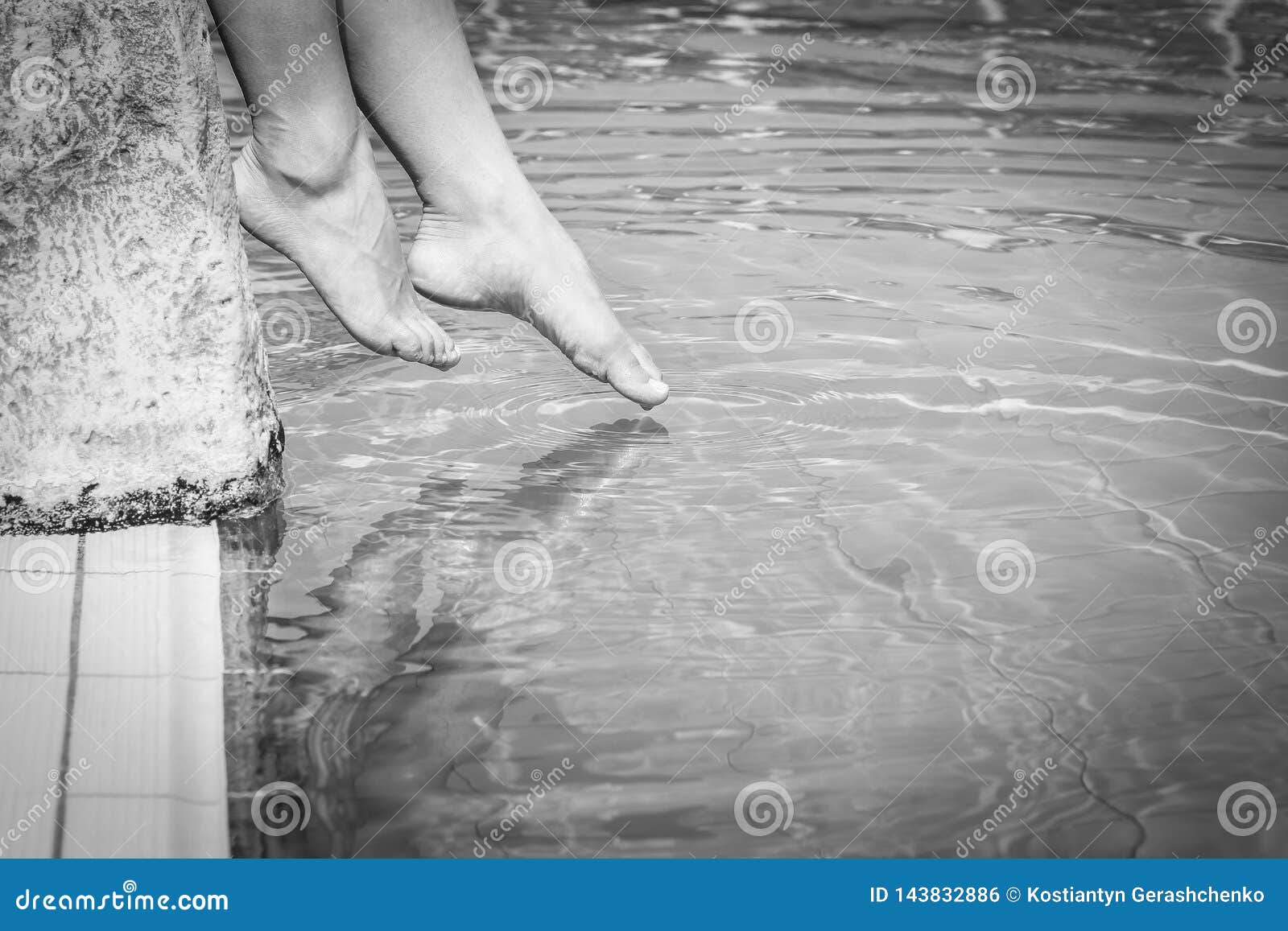 Beautiful Legs Of A Girl Near A Swimming Pool On The Sea Backgrou