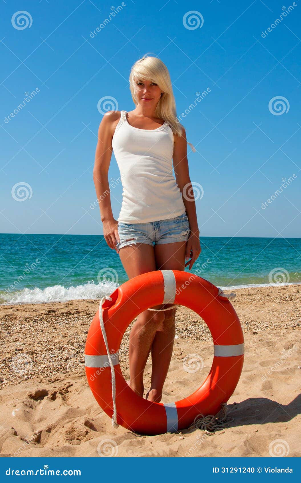 Beautiful lifeguard at sea stock photo. Image of rescuer 