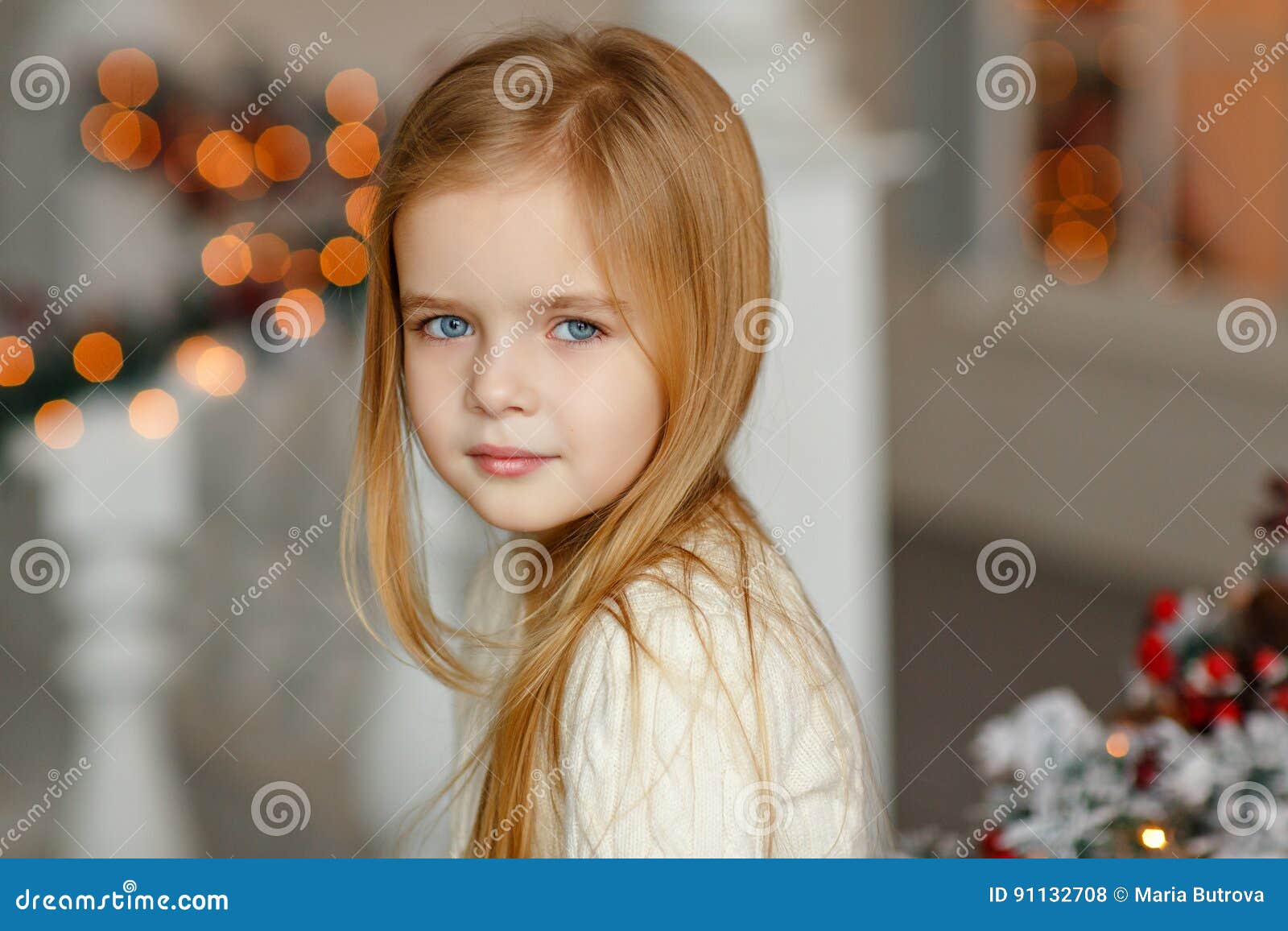 Beautiful Little Blond Girl With Blue Eyes Smiling At The New Ye
