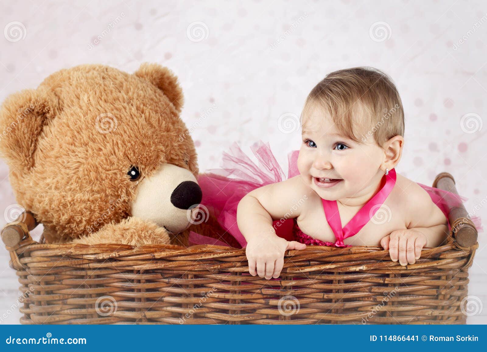 Beautiful Little Girl with Big Teddy Bear in the Wicker Basket ...