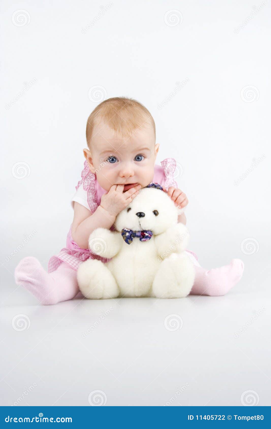 beautiful little girl with cuddle-bear.