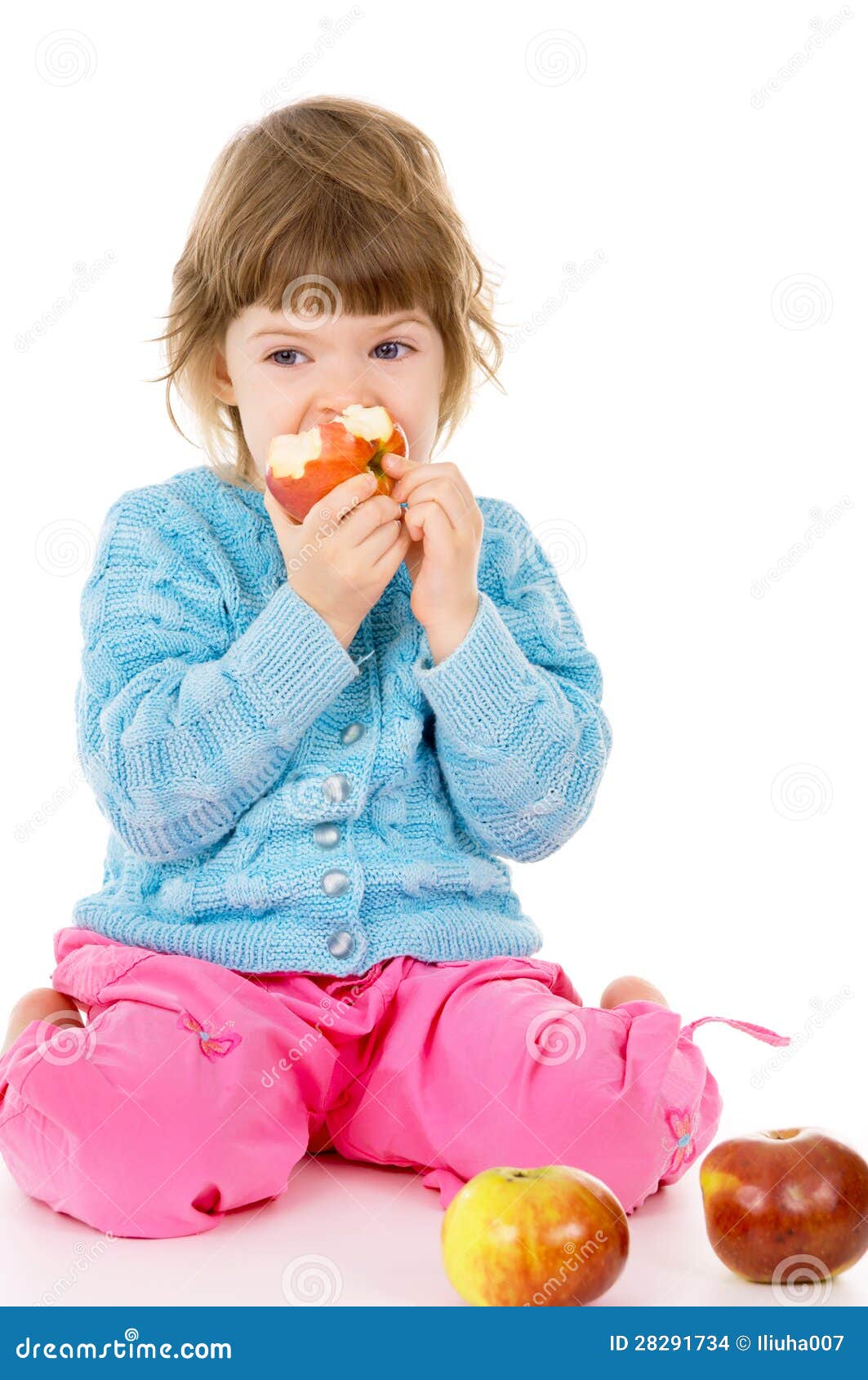 A Beautiful Little, Girl Eats Apples Stock Photo Image of hands