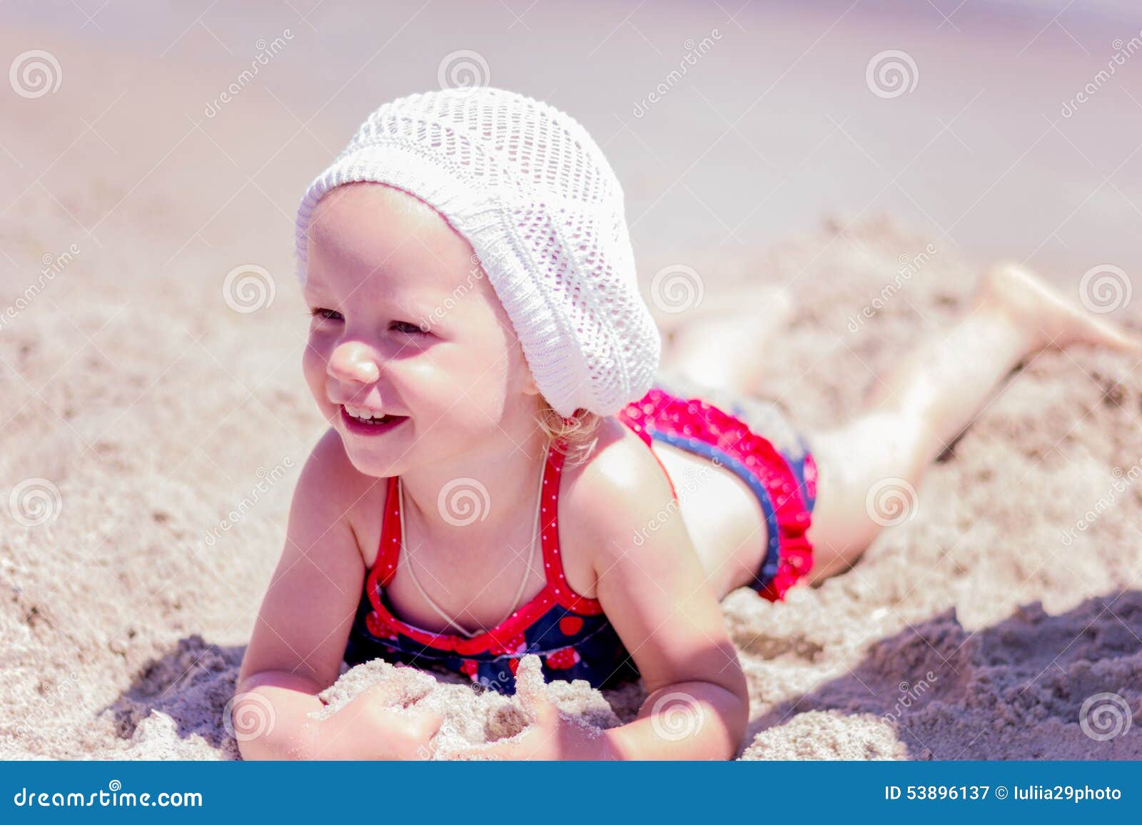 Beautiful Little Girl Lying on the Beach Stock Image Image of focus