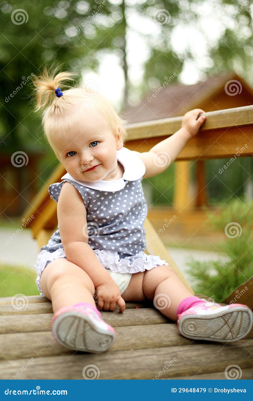 Beautiful Little Girl Siting on the Bridge Stock Image - Image of ...
