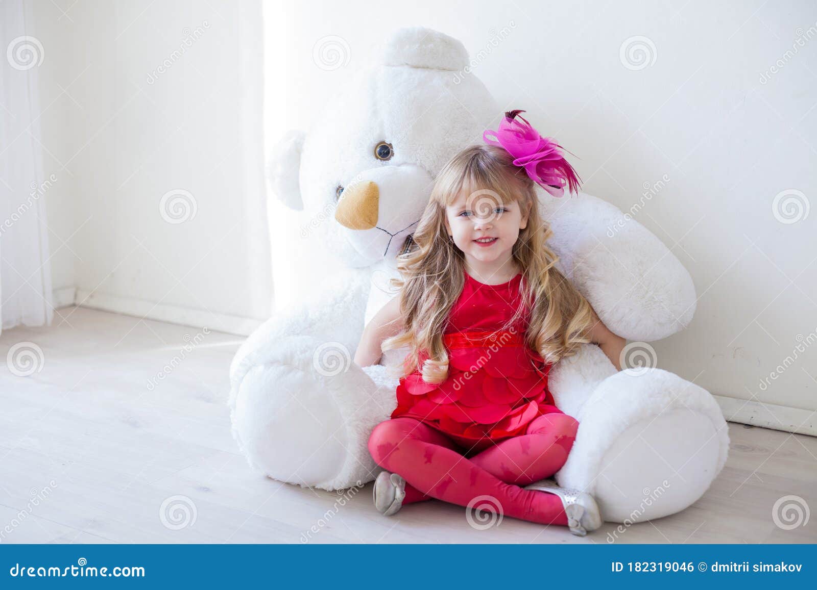 Beautiful Little Girl with Toy Big Teddy Bear Stock Photo - Image ...