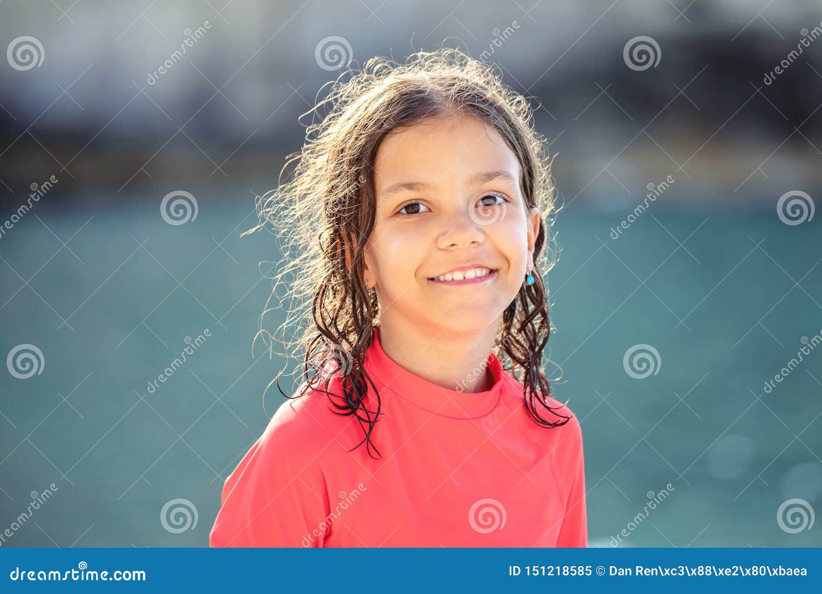 Portrait, Little Girl On Beach, Child Looking, Smiling In 