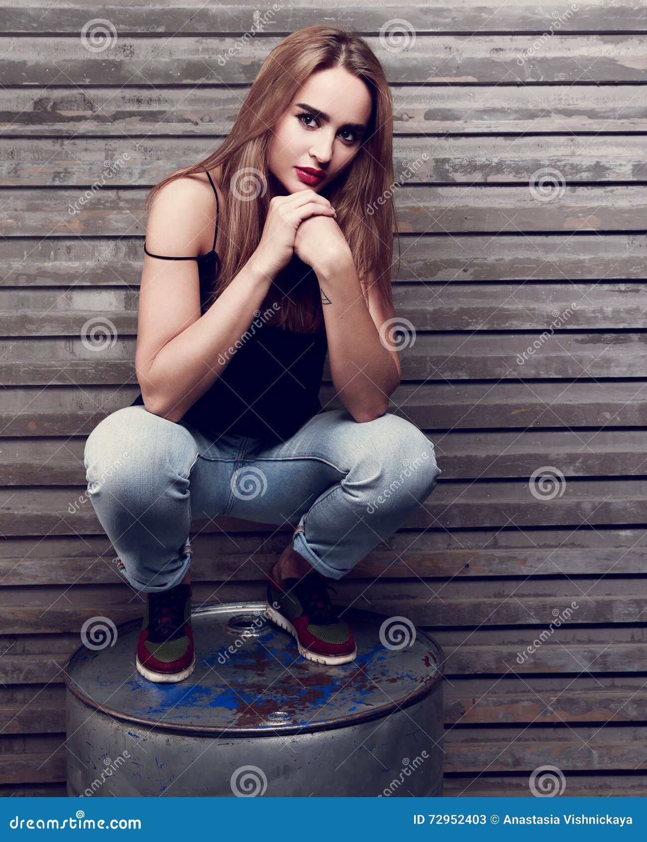 Beautiful Long Hair Woman Thinking with Hands Under Face Sitting